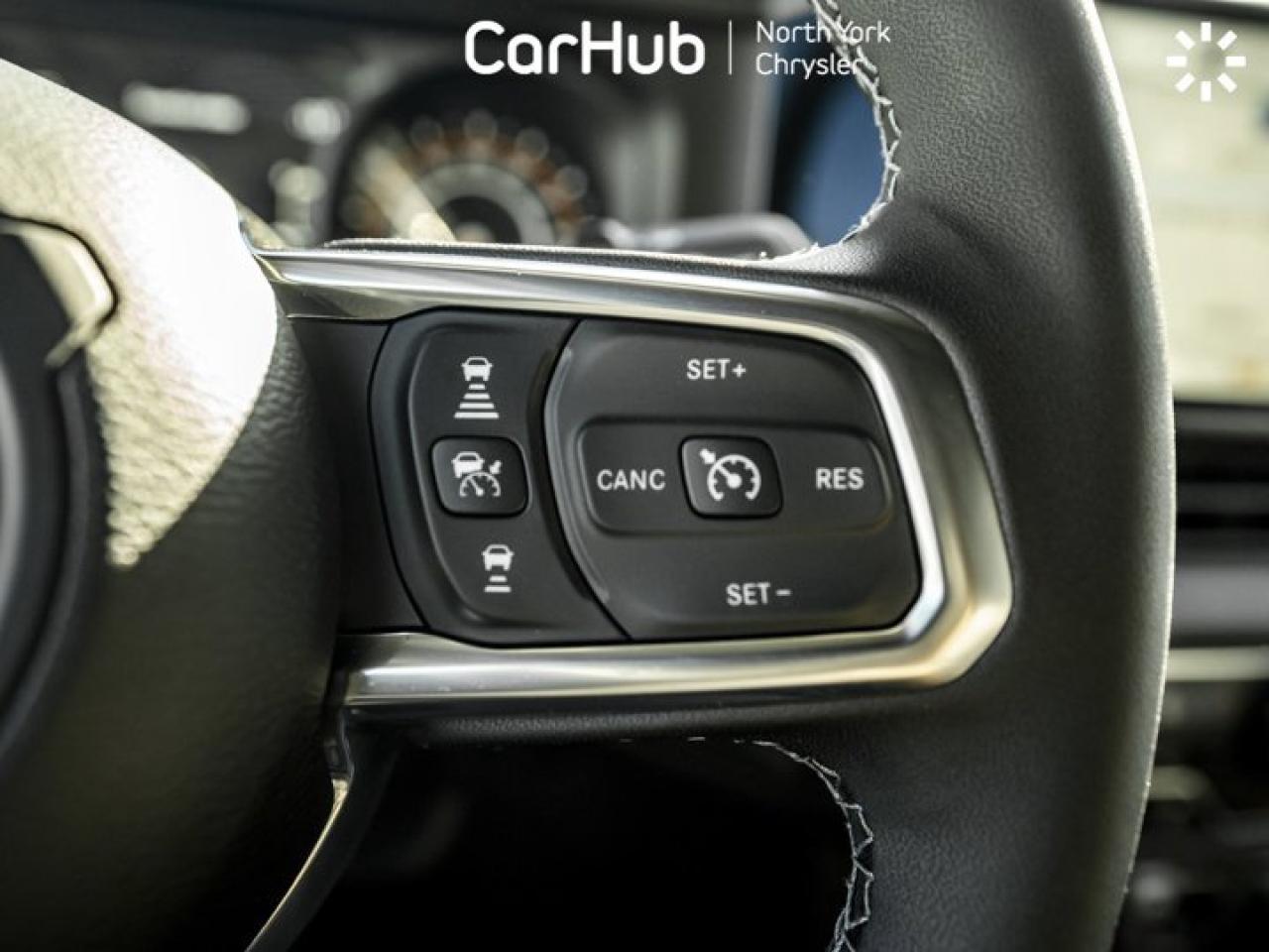 2026 Jeep Wrangler Sahara 4x4 Skyroof Safety Group UConnect 5 12'' Screen  Remote Start Photo