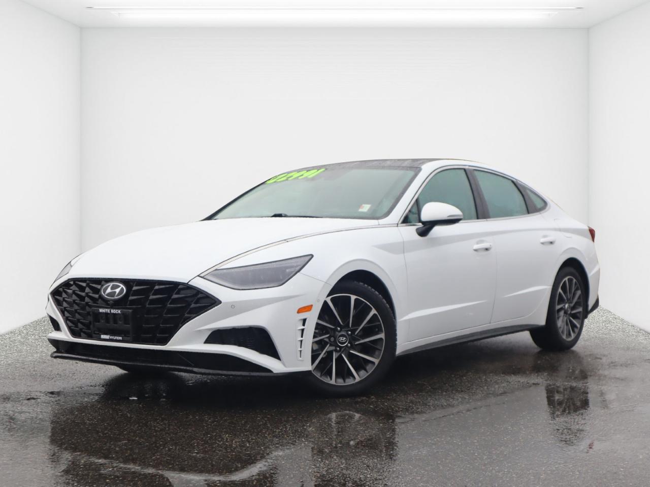 APPLE CARPLAY | ANDROID AUTO | ONE OWNER | TPMS | HIGH BEAM ASSIST | LED DAYTIME RUNNING LIGHTS | HEATED FRONT SEATS | HEATED REAR SEATS | VENTILATED SEATS | LEATHER INTERIOR | HEADS UP DISPLAY | WIRELESS DEVICE CHARGING PAD | HEATED STEERING WHEEL | BLIND SPOT COLLISION | REAR CROSS TRAFFIC COLLISION AVOIDANCE ASSIST | FORWARD COLLISION AVOIDANCE ASSIST | LANE KEEPING ASSIST | LANE FOLLOWING ASSIST | DRIVER ATTENTION WARNING |<br /><br />Experience luxury and sophistication with the 2021 Hyundai Sonata Ultimate, now available at Murray Hyundai White Rock with 88,011 kms. This premium sedan offers a refined drive with a turbocharged engine, upscale interior featuring leather seating, panoramic sunroof, advanced safety technology, and a large touchscreen with Apple CarPlay and Android Auto. Visit Murray Hyundai White Rock today and enjoy exceptional comfort, style, and value in a well-maintained Sonata Ultimate.<br /><br />Recent Arrival! 2021 Hyundai Sonata Ultimate Quartz White I4 8-Speed Automatic with Overdrive FWD<br /><br /><br />Why Buy From us?<br />*7x Hyundai President's Award of Merit Winner<br />*3x Consumer Choice Award for Business Excellence<br />*AutoTrader Dealer of the Year<br /><br />M-Promise Certified Preowned ($995 value):<br />- 30-day/2,000 Km Exchange Program<br />- 3-day/300 Km Money Back Guarantee<br />- Comprehensive 144 Point Mechanical Inspection<br />- Full Synthetic Oil Change<br />- BC Verified CarFax<br />- Minimum 6 Month Power Train Warranty<br /><br />Our vehicles are priced under market value to give our customers a hassle free experience. We factor in mechanical condition, kilometres, physical condition, and how quickly a particular car is selling in our market place to make sure our customers get a great deal up front and an outstanding car buying experience overall. At White Rock Hyundai, we help you get where you want to go. *All vehicle purchases are subject to a $599 administration fee. *Dealer #31129.<br /><br />Certified. Hyundai Details:<br /><br />* Transferable 6-Year/120,000 km Powertrain Limited Warranty. This is an additional 1 year/20, 000 km beyond the original factory warranty<br />* 1 year 24 hour roadside assistance<br />* CarFax<br />* Enjoy preferred financing rates on select models<br />* 195 point inspection<br />* 30 day / 2000 km exchange privilege policy<br /><br /><br />Awards:<br />* ALG Canada Residual Value Awards, Residual Value Awards<br /><br />CALL NOW!! This vehicle will not make it to the weekend!!