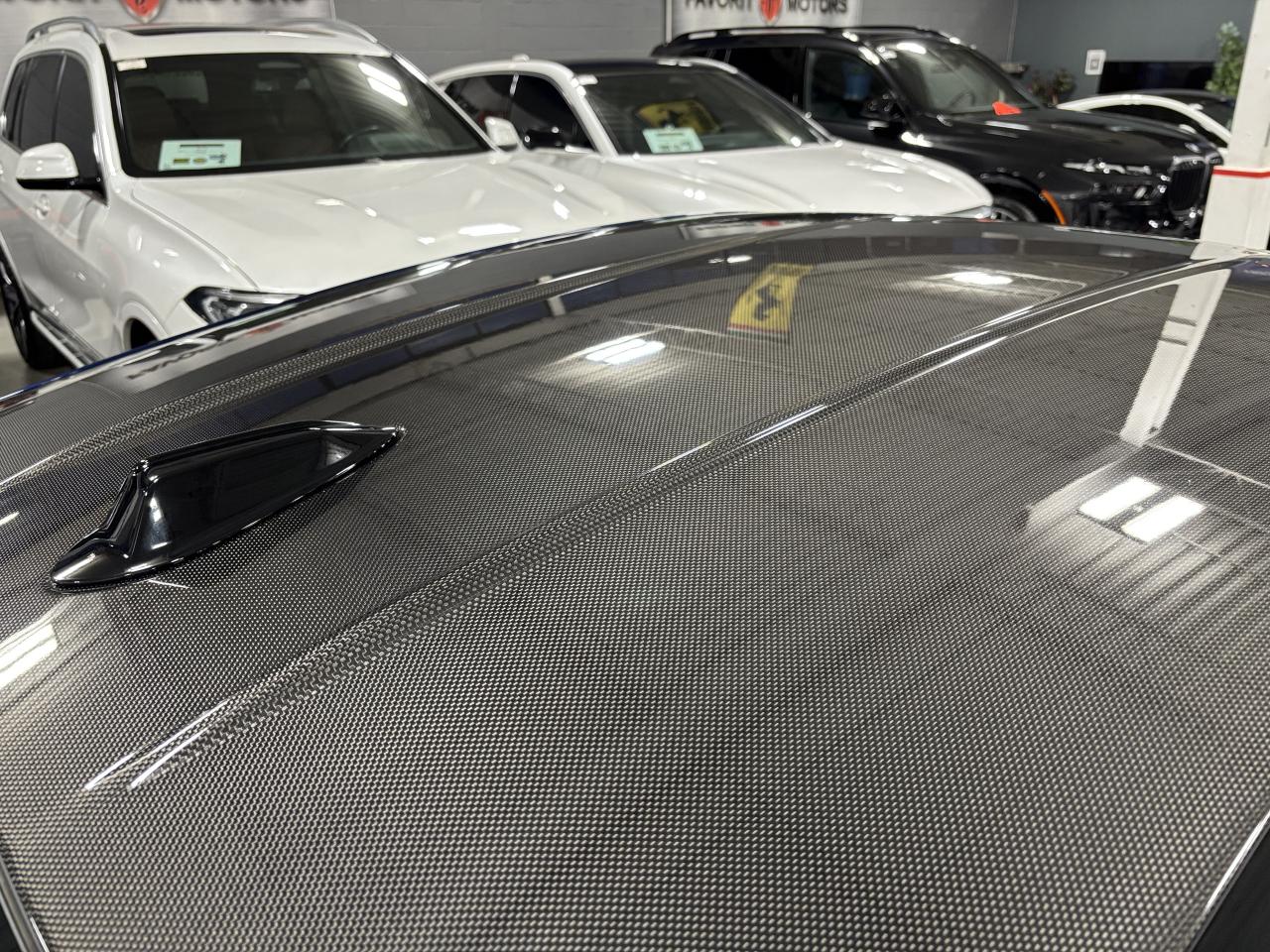 2026 BMW M4 COUPE|RWD|MANUAL| NO LUX TAX |CARBONROOF|HUD|NAV|+ Photo