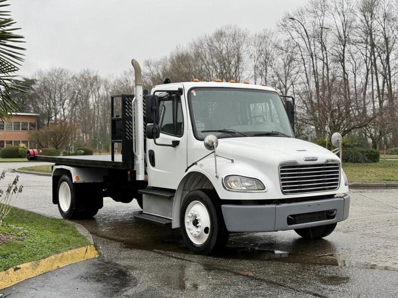 This 2019 Freightliner M2 106 hook truck is equipped with a 14 foot roll-off flat deck and powered by a 6.7L Cummins diesel engine paired with an automatic transmission and RWD drivetrain. It features a PTO-driven hook system, hydraulic brakes, air-assisted components, and integrated storage compartments, making it suitable for roll-off container and hauling applications. The cab includes air conditioning and heat, AM/FM radio, cloth seating, and a white exterior with grey interior. Overall vehicle measurements are approximately 24 feet 8 inches long, 8 feet 6 inches wide, and 9 feet 10 inches high. This item is currently OFFSITE. You must register an appointment with our office to schedule an offsite viewing. Appointments must be made a minimum of one business day in advance (and as defined by the days that Repo.com is open for business) before your appointment can be scheduled and confirmed. We may, at our own discretion, instead opt to transport smaller items to Repo.coms main yard for viewing purposes.  $135,720.00 plus $375 processing fee, $136,095.00 total payment obligation before taxes.  Listing report, warranty, contract commitment cancellation fee, financing available on approved credit (some limitations and exceptions may apply). All above specifications and information is considered to be accurate but is not guaranteed and no opinion or advice is given as to whether this item should be purchased. We do not allow test drives due to theft, fraud, acts of vandalism and undetectable impaired driving. Instead we provide the following benefits: Complimentary Warranty (with options to extend), Limited Money Back Satisfaction Guarantee on Fully Completed Contracts, Contract Commitment Cancellation, and an Open-Ended Sell-Back Option. Ask seller for details or call 604-522-REPO(7376) to confirm listing availability.
