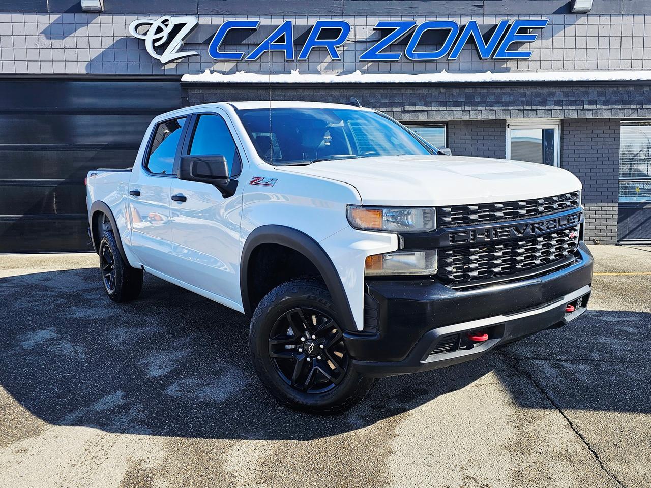 <p>Looking for a rugged and capable pickup truck thats ready for any adventure? Look no further than this 2019 Chevrolet Silverado 1500 Custom Trail Boss, available now at Car Zone! This powerful machine boasts a striking white exterior, complemented by a sleek black interior, making a bold statement on the road or the trail. Under the hood, youll find a robust 5.3L V8 engine, ready to deliver impressive performance and capability, all while offering the convenience of an automatic transmission and the confidence of 4-wheel drive. With 242,041 km on the odometer, this Silverado has proven its reliability and is eager to take on many more adventures.</p><p>This Silverado 1500 Custom Trail Boss is built for those who demand more from their vehicle. This truck is ready to handle whatever you throw at it.</p><p>Here are a few of the features that make this truck a standout:</p><ul><li><strong>Trail Boss Capability:</strong> Conquer any terrain with the factory-installed off-road package.</li><li><strong>Powerful V8 Engine:</strong> Experience exhilarating performance with the robust 5.3L V8.</li><li><strong>4-Wheel Drive Confidence:</strong> Tackle challenging conditions with ease.</li><li><strong>Aggressive Styling:</strong> Turn heads with the Silverados bold and commanding presence.</li><li><strong>Spacious Crew Cab:</strong> Comfortable seating for passengers and plenty of room for cargo.</li></ul><p>&nbsp;</p><p>Looking for Your Dream Car? Call Car Zone Today!</p><p>Thanks for viewing our Car Zone inventory. All of our vehicles come fully detailed with a Carfax and a mechanical fitness assessment. Drive this home today! Easy financing options. All credit welcome.&nbsp;<strong><a href=http://www.carzonecalgary.ca/finance>APPLY NOW</a>&nbsp;</strong>We even take trades. Same day approvals at&nbsp;<a href=http://www.carzonecalgary.ca/><strong>CARZONECALGARY</strong></a> or visit us in person at 2036 36 Street SE Calgary for a hassle free test drive. Let our friendly team of experts book an appointment with you and show you the Car Zone difference! AMVIC licensed dealer.&nbsp;</p>