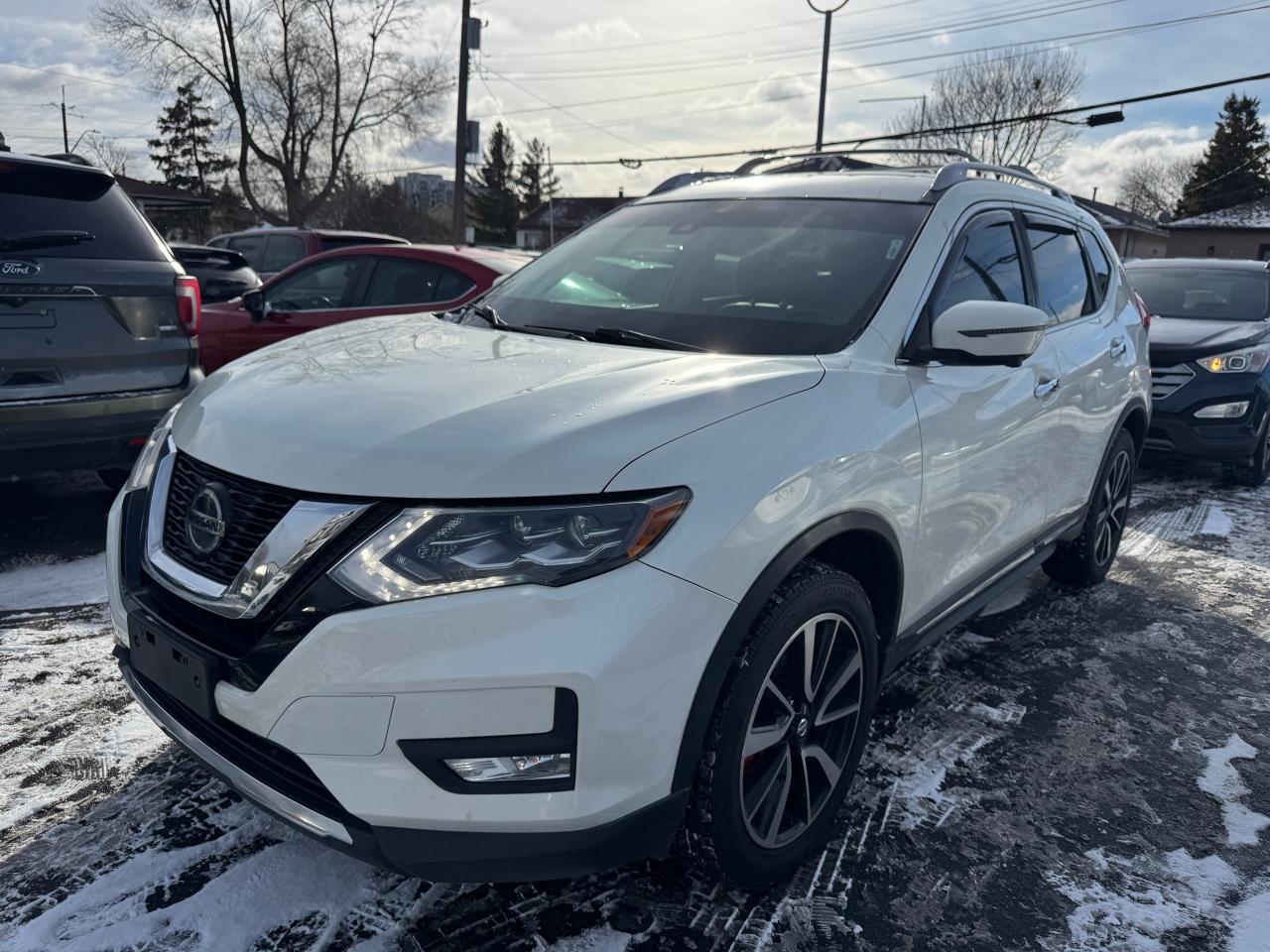 <p class=p1><strong>Certified 2018 Nissan Rogue SL AWD | Navigation | Leather | Panoramic Roof</strong></p><p class=p2>&nbsp;</p><p class=p3>This <span class=s1><strong>Certified 2018 Nissan Rogue SL AWD</strong></span> offers refined comfort, advanced safety, and confident all-season performance. A well-equipped SUV that feels upscale, drives smoothly, and is ideal for daily commuting or family use.</p><p class=p2>&nbsp;</p><p class=p1><strong>Key Highlights</strong></p><p class=p4>&nbsp;</p><ul><li><p class=p1>2.5L 4-Cylinder Engine | Automatic Transmission</p></li><li><p class=p1>All-Wheel Drive (AWD) with <span class=s1><strong>AWD LOCK Mode</strong></span></p></li><li><p class=p1><strong>ECO & SPORT Drive Modes</strong></p></li><li><p class=p1>Navigation System</p></li><li><p class=p1><strong>360&deg; Around View Monitor</strong><span class=s1> & Backup Camera</span></p></li><li><p class=p1>Leather Interior</p></li><li><p class=p1>Heated Front Seats & Heated Steering Wheel</p></li><li><p class=p1>Panoramic Sunroof</p></li><li><p class=p1>Blind Spot Monitoring & Rear Cross-Traffic Alert</p></li><li><p class=p1>Power Liftgate</p></li><li><p class=p1>Power Driver Seat with Memory</p></li><li><p class=p1>Dual-Zone Climate Control</p></li><li><p class=p1>Bluetooth Hands-Free Calling & Audio Streaming</p></li><li><p class=p1>Keyless Entry & Push-Button Start</p></li><li><p class=p1>Alloy Wheels, Traction Control & ABS</p></li></ul><p>&nbsp;</p><p class=p2>&nbsp;</p><p class=p3>✔ Runs and drives excellent</p><p class=p1><span class=s3>✔ </span><strong>CARFAX Verified &ndash; Clean history & lien-free</strong></p><p class=p3>✔ Certified & safety inspected</p><p class=p2>&nbsp;</p><p class=p1><strong>OMVIC Licensed Dealership</strong></p><p class=p3>No hidden fees &mdash; vehicle price + HST + licensing only</p><p class=p3>Trade-ins welcome | Financing available</p><p class=p3>Ontario-wide delivery available</p><p class=p2>&nbsp;</p><p class=p3>📍 74 Parkdale Avenue North, Hamilton, Ontario</p><p class=p3>📞 (905) 975-9705 | (905) 462-5542</p><p class=p3>📧 Gusmarkos@gmail.com</p><p class=p3>🗓 Test drives by appointment only</p>