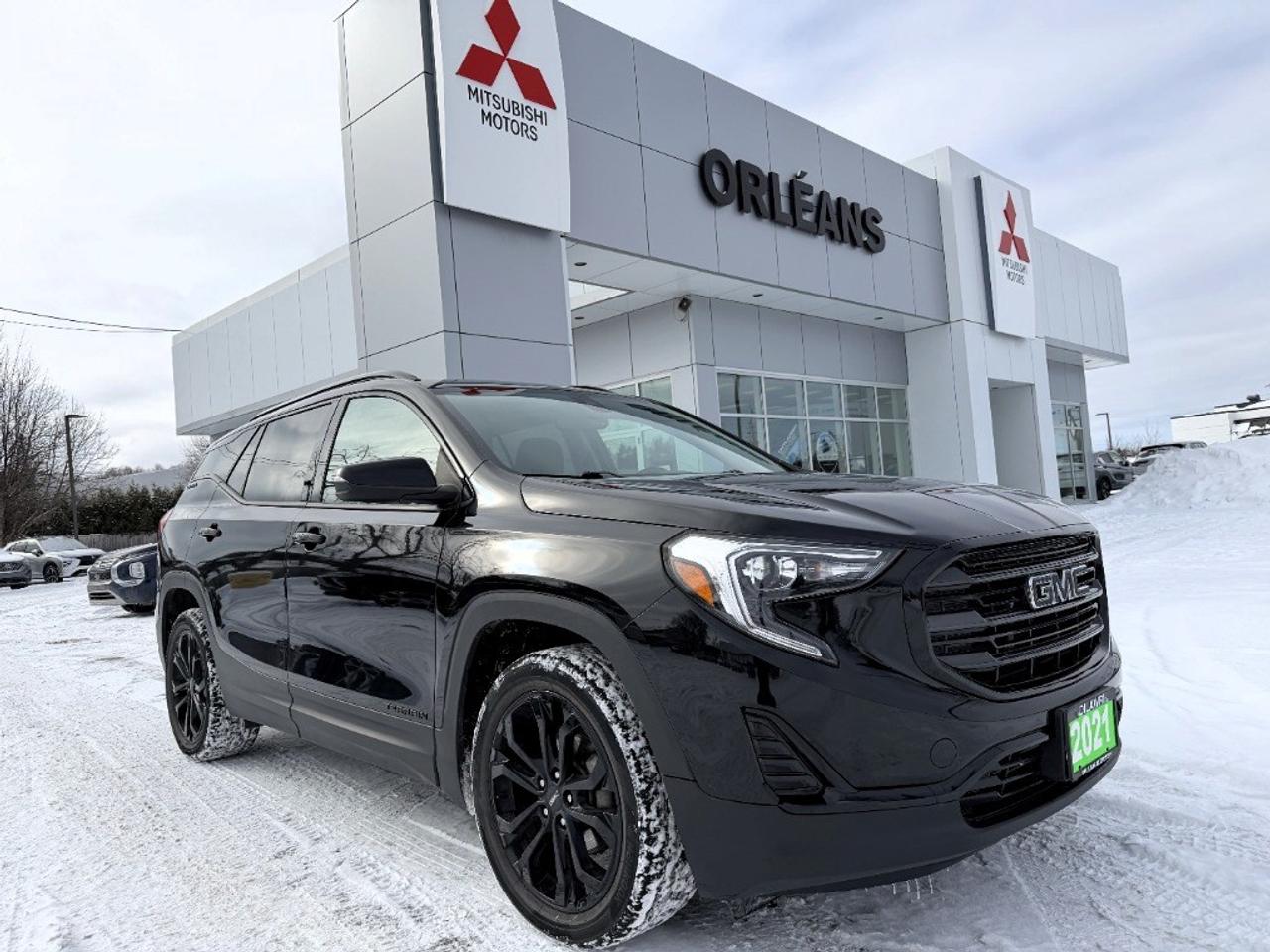 The 2021 GMC Terrain SLE in a sophisticated Black finish is an all-wheel drive (AWD) SUV that strikes a perfect balance between capability and control. With its seamless Automatic transmission, it promises a responsive and smooth driving experience whether youre cruising city streets or exploring the open road. On the exterior, the black finish is complemented by stylish alloy wheels, giving it a bold stance. Step inside to discover a cabin designed around your comfort and convenience, featuring heated front seats, a leather steering wheel, and power-adjusted seating to keep you at ease during every drive. The keyless entry and remote start further enhance your everyday travel. Tech enthusiasts will appreciate the smart device integration and a reliable Wi-Fi hotspot, perfect for staying connected on the go. Safety is not compromised with added features such as a backup camera for easier parking, lane assist for enhanced road safety, and heated mirrors to maintain clear visibility during those chilly mornings. This SUV can suit families and adventurers alike, making it an ideal choice for those seeking a reliable and versatile vehicle. We invite you to contact us today for more information and to schedule a test drive of this exceptional GMC Terrain SLE. Experience comfort and capability firsthand with a vehicle designed to fit your lifestyle. **ADVERTISED SALE PRICE IS BASED ON FINANCE PURCHASE**