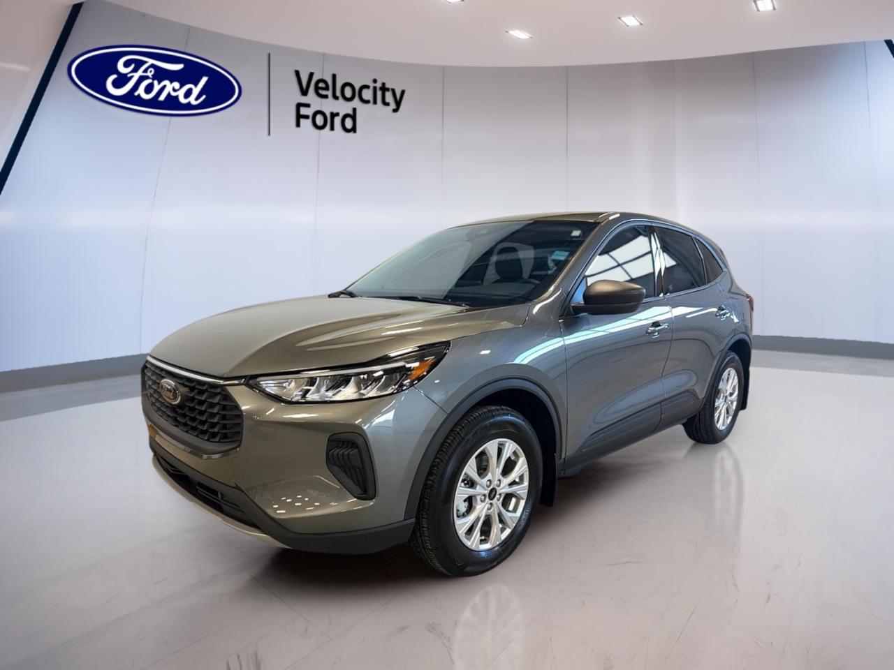 Experience the versatility and modern appeal of the brand new 2026 Ford Escape Active AWD, now available at Velocity Ford in Moose Jaw. This grey SUV with a dark grey interior is engineered for Canadian drivers seeking comfort, safety, and advanced technology. With four doors, an efficient 1.5-litre gas engine, and automatic 8-speed transmission, its ready for every journey.

ADVANCED SAFETY FEATURES  
»» Anti-Lock Braking System (ABS) for controlled stops  
»» Blind Spot Monitor enhances lane-changing confidence  
»» Lane Departure Warning helps maintain safe positioning  
»» Multiple airbags including side impact protection  

PERFORMANCE AND EFFICIENCY  
»» 1.5-litre gas engine delivers responsive power  
»» All-wheel drive for enhanced traction in all seasons  
»» Limited slip differential for improved stability  
»» Automatic 8-speed transmission ensures smooth shifting  

COMFORT AND CONVENIENCE  
»» Dual-zone climate control for personalized comfort  
»» Heated front seats for cold Canadian mornings  
»» Power steering and adjustable steering wheel  
»» Illuminated vanity mirrors for both driver and passenger  

TECHNOLOGY AND CONNECTIVITY  
»» Bluetooth integration for hands-free communication  
»» WiFi hotspot keeps you connected on the go  
»» Steering wheel audio controls for easy access  
»» Satellite radio for a variety of entertainment options  

CARGO SPACE  
»» Rear trunk access for easy loading  
»» Split-folding rear seats to maximize space  
»» Ample room for groceries, gear, or luggage  
»» Tinted windows to protect your cargo from sunlight  

WHAT OTHER OWNERS LIKE  
»» Confident all-weather handling with AWD system  
»» User-friendly technology and connectivity features  
»» Comfortable ride and supportive seating  
»» Practical cargo space for daily needs  

This 2026 Ford Escape Active AWDs VIN is: 1FMCU9GN2TUA36711.