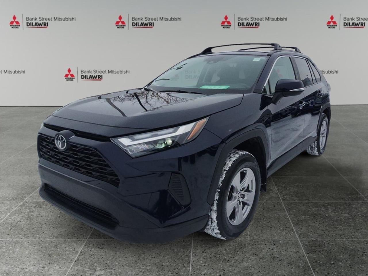 Balance of 5 year/100,000kms BASIC warranty and 10 year/160,000kms Factory Powertrain Warranty on ALL MITSUBISHI products! Best in the industry!!!! Introducing the 2022 Toyota RAV4 XLE in a striking AWD configuration. This SUV is equipped with advanced handling to confidently tackle any road conditions you encounter. The exterior is accentuated by sleek alloy wheels and a stylish sunroof, perfect for those who enjoy a little open-air driving. Stand out in the crowd with elegantly designed heated mirrors and LED lighting details. Inside, comfort and sophistication intertwine in a spacious and well-appointed cabin, featuring a heated leather steering wheel, leatherette door trim, and power-adjustable seats that ensure your comfort on every journey. Immerse yourself in cutting-edge technology with smart device integration, a wi-fi hotspot, and a backup camera that keeps you connected and secure no matter where the road leads. Take advantage of the hands-free keyless entry and navigation through modern conveniences such as adaptive cruise control and lane assist for a relaxed and safe driving experience. Ideal for families, outdoor enthusiasts, or anyone looking to upgrade their ride, the 2022 Toyota RAV4 XLE AWD is ready to enhance your adventures. Contact us now to learn more about how you can make this exceptional SUV your own.