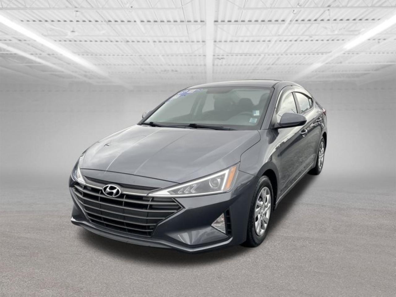 Steele Hyundai MVI and Ride. All MVI and Ride vehicles have been inspected and brought up to provincial motor vehicle inspection standards.We also change the oil as part of our process to get this vehicle ready for you.Warranty: There is a 30-day 50/50 split warranty on parts and labor on any motor vehicle inspection items.Please note items such as air conditioning & engine lights are not MVI related items.TRADE INS ARE WELCOME.PERFORMED NEW MVIREPLACED OIL AND FILTERREPLACED FRONT BRAKE PADSREPLACED FRONT BRAKE ROTORSREPLACED REAR LEFT WHEEL CYLINDERREPLACED REAR RIGHT WHEEL CYLINDERREPLACED AIR FILTERREPLACED CABIN AIR FILTER2019 Hyundai Elantra Essential Smart, Reliable & Fuel-EfficientThe 2019 Hyundai Elantra Essential is a compact sedan that delivers excellent fuel efficiency, modern styling, and proven reliabilitymaking it a perfect choice for daily commuting or a first vehicle. Comfortable, easy to drive, and economical, the Elantra continues to be one of Hyundais most popular models.Key Features Include:2.0L 4-Cylinder EngineAutomatic TransmissionHeated Front SeatsHeated Steering WheelBluetooth Hands-Free ConnectivityTouchscreen Display with USB & AUX InputsBackup CameraAir ConditioningCruise ControlSplit-Folding Rear Seats for Added Cargo FlexibilityWith a smooth ride, spacious interior, and low cost of ownership, the Elantra Essential offers outstanding value in a stylish and dependable package.Available now at Steele HyundaiContact us today to schedule your test drive!Steele Hyundai Driven by trust.