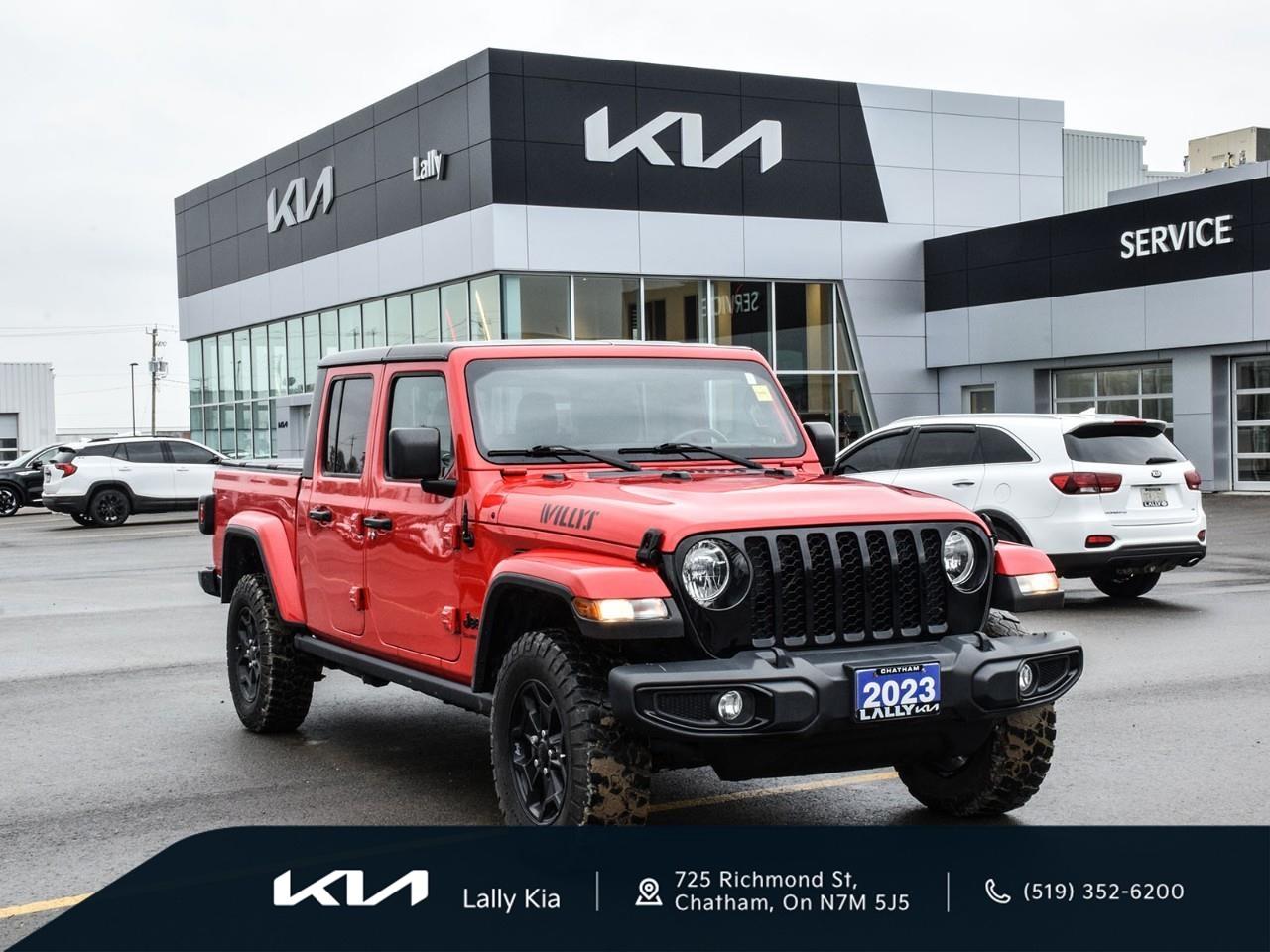 <p><strong>2023 Jeep Gladiator Sport S Willys 4x4  Low KMs, Clean CarFax</strong></p><p>This rugged Gladiator Sport S Willys is built for versatility and confidence, featuring <strong>4x4</strong>, <strong>Heated Cloth Seats</strong>, a <strong>Hardtop</strong>, and <strong>Trailer Tow</strong> capability. Perfect for winter driving or off-road adventures, the 4x4 system and heated features provide added traction, confidence, and comfort when the temperatures drop.</p><p><strong>Proudly serving our community, Lally Kia makes your car-buying experience simple, transparent, and worry-free.</strong></p> <p>We use no hassle no haggle live market pricing! Save money and time.</p><p>All prices shown include all fees. Reconditioning and Full Detailing. Taxes and Licensing extra.</p><p>All Pre-Owned vehicles come standard with one key. If we received additional keys from the previous owner they will be with the vehicle upon delivery at no cost. Additional keys may be purchased at customers requested and expense.</p><p>Book your appointment today!</p>