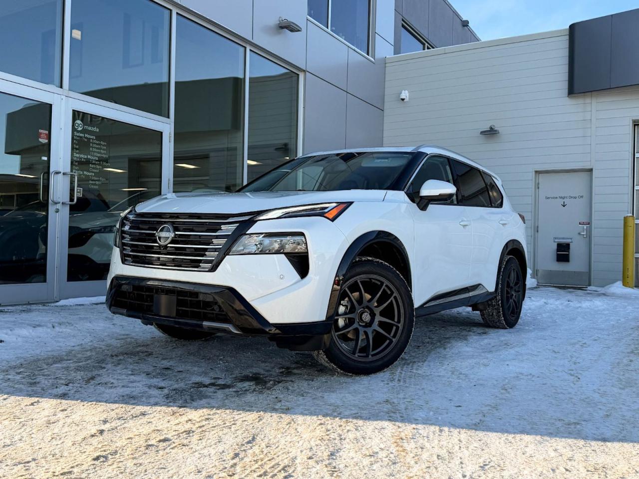 Discover the exceptional 2025 Nissan Rogue Platinum AWD in sleek White  a perfect blend of style, performance, and advanced technology. Powered by a turbocharged 1.5L engine paired with smooth Xtronic CVT transmission and equipped with all-wheel drive, its ready for any adventure.Step inside to luxurious heated semi-aniline leather seats with quilted accents, 12.3-inch touchscreen navigation, and dual-zone climate control for your ultimate comfort. Safety is paramount with 11 airbags, advanced driver assists including lane departure prevention, blind-spot detection, and pedestrian impact prevention.Enjoy convenience with a power liftgate, wireless charging, multiple USB ports, and seamless smartphone integration. With premium 19 dark painted alloy wheels and a sophisticated interior featuring memory settings and ambient lighting, this Rogue Platinum offers unmatched refinement.This well-equipped, pre-owned Nissan Rogue elevates every drive  schedule your test drive today and experience excellence!Go Mazda is AMVIC licensed business.Clean CarFax