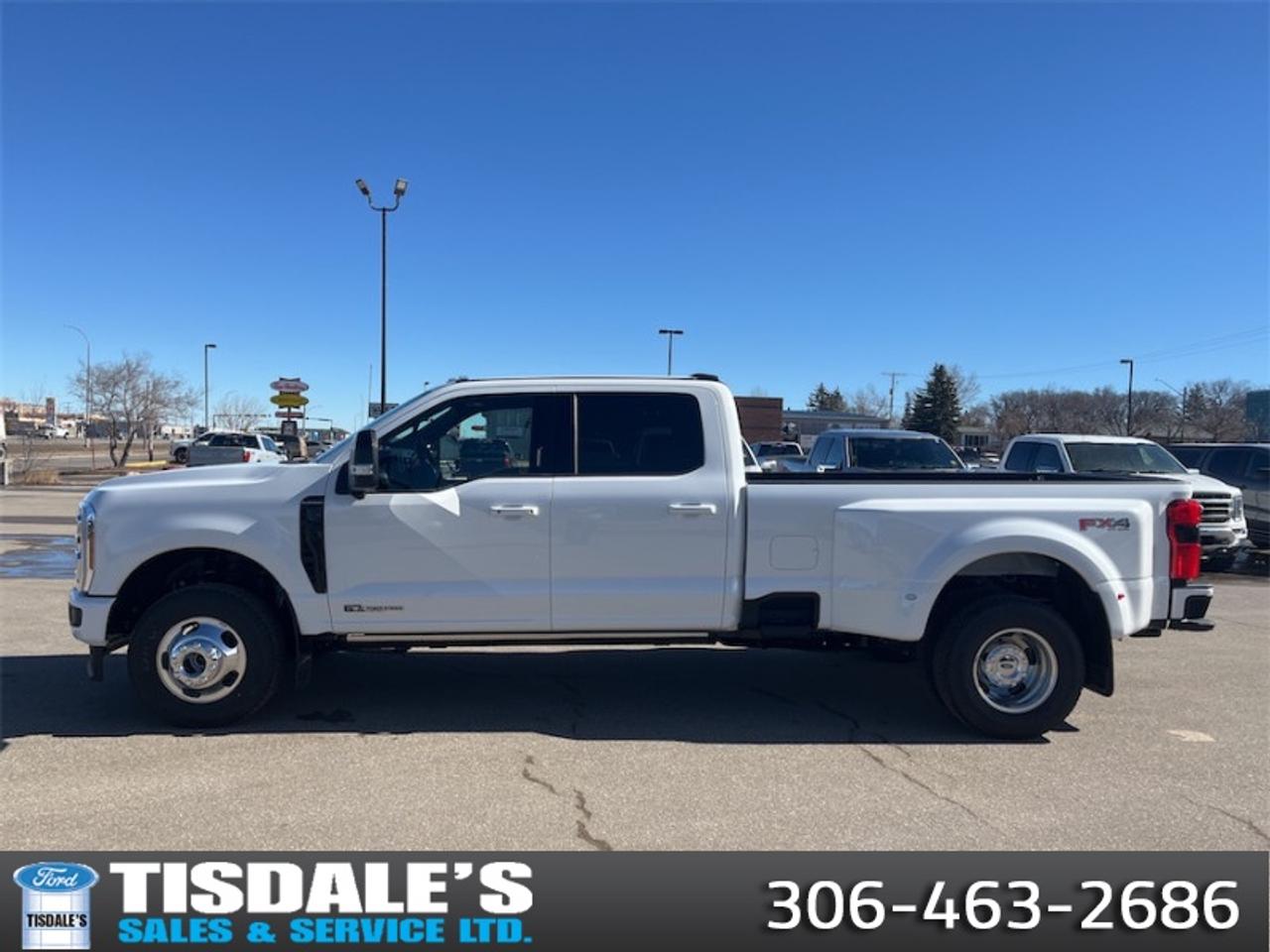 <b>FX4 Off-Road Package, Spray-in Bedliner!</b><br> <br> Check out the large selection of new Fords at Tisdales today!<br> <br>Brutish power and payload capacity are key traits of this Ford F-350, while aluminum construction brings it into the 21st century.<br> <br>The most capable truck for work or play, this heavy-duty Ford F-350 never stops moving forward and gives you the power you need, the features you want, and the style you crave! With high-strength, military-grade aluminum construction, this F-350 Super Duty cuts the weight without sacrificing toughness. The interior design is first class, with simple to read text, easy to push buttons and plenty of outward visibility. This truck is strong, extremely comfortable and ready for anything.<br> <br>This Star White Tri-Coat sought after diesel Crew Cab 4X4 pickup has an Automatic transmission and is powered by a 475HP 6.7L 8 Cylinder Engine. <br> <br> Our Super Duty F-350s trim level is Platinum. This F-350 Platinum is embellished with chrome exterior accents and unique exterior styling, with power running boards, adaptive cruise control, a drivers heads-up display and retractable rear steps, along with Platinum-themed leather-trimmed heated and ventilated front seats with power adjustment, memory function and lumbar support, a heated leather-wrapped steering wheel, voice-activated dual-zone automatic climate control, power-adjustable pedals, a sonorous 8-speaker Bang & Olufsen audio system, and two 120-volt AC power outlets. This truck is also ready to get busy, with equipment such as class V towing equipment with a hitch, trailer wiring harness, a brake controller and trailer sway control, beefy suspension with heavy duty shock absorbers, power extendable trailer style mirrors, up-fitter switches, and LED headlights with front fog lamps and automatic high beams. Connectivity is handled by a 12-inch infotainment screen powered by SYNC 4, bundled with Apple CarPlay, Android Auto, inbuilt navigation, and SiriusXM satellite radio. Safety features also include lane keeping assist with lane departure warning, a surround camera system, pre-collision assist with automatic emergency braking and cross-traffic alert, blind spot detection, rear parking sensors, forward collision mitigation, and a cargo bed camera. This vehicle has been upgraded with the following features: FX4 Off-Road Package, Spray-in Bedliner.<br><br> View the original window sticker for this vehicle with this url <b><a href=http://www.windowsticker.forddirect.com/windowsticker.pdf?vin=1FT8W3DT1TED62319 target=_blank>http://www.windowsticker.forddirect.com/windowsticker.pdf?vin=1FT8W3DT1TED62319</a></b>.<br> <br>To apply right now for financing use this link: <a href=http://www.tisdales.com/shopping-tools/apply-for-credit.html target=_blank>http://www.tisdales.com/shopping-tools/apply-for-credit.html</a><br> <br/>5.49% financing for 84 months. <br> Buy this vehicle now for the lowest bi-weekly payment of <b>$873.62</b> with $0 down for 84 months @ 5.49% APR O.A.C. ( Plus applicable taxes - $699 administration fee included in sale price. ). Incentives expire 2026-08-31. See dealer for details. <br><br>Tisdales is not your standard dealership. Sales consultants are available to discuss what vehicle would best suit the customer and their lifestyle, and if a certain vehicle isnt readily available on the lot, one will be brought in. o~o