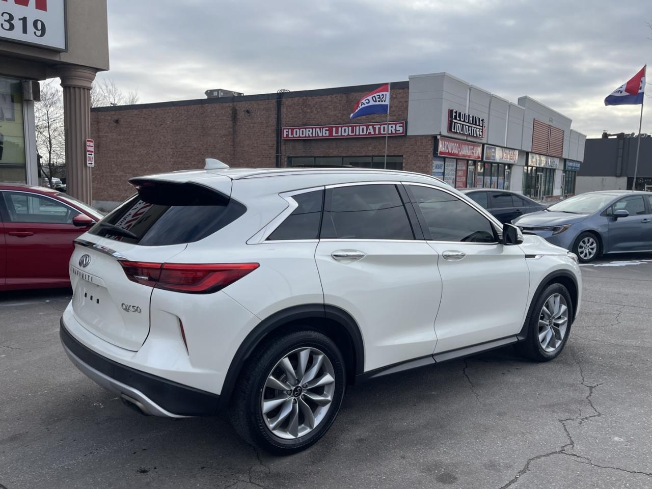 2021 Infiniti QX50 LUXE AWD Pearl white Leather   PRO PILOT   Htd Sea Photo