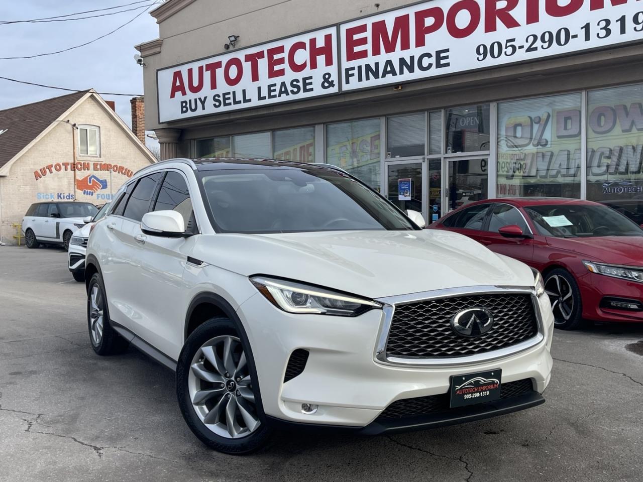 2021 Infiniti QX50 LUXE AWD Pearl white Leather   PRO PILOT   Htd Sea Photo0