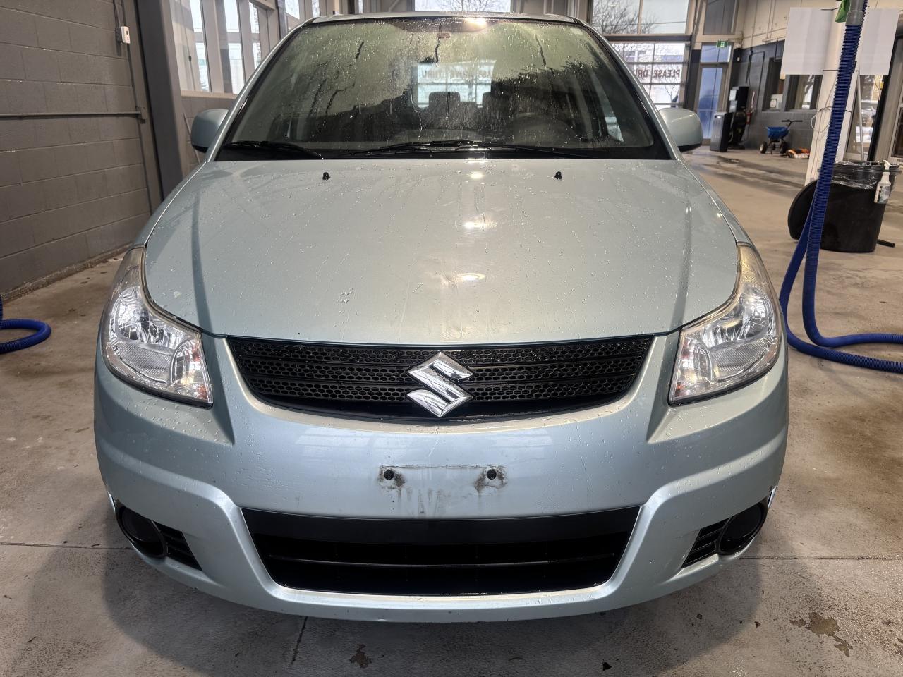 2007 Suzuki SX4 VERY LOW KM   CLEAN CARFAX   SOLD ASIS   AUTOMATIC Photo