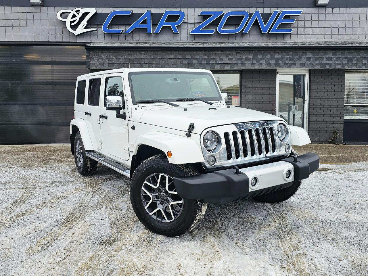 <p>Conquer any terrain in this rugged 2015 Jeep Wrangler Sahara, now available at Car Zone! This iconic 4-door SUV is ready for adventure with its powerful 3.6L V6 engine and robust 4-wheel drive system, perfect for navigating both city streets and off-road trails. With a classic white exterior and a comfortable leather<span style=font-size: 1em;>&nbsp;interior, this Wrangler offers a timeless appeal thats sure to turn heads wherever you go. This Wrangler has 224,893km on the odometer.</span></p><p>This Jeep Wrangler Sahara is more than just a vehicle; its a statement. Embrace the freedom of open-air driving with its removable top and doors, allowing you to fully experience the thrill of the outdoors. Whether youre planning a weekend getaway or simply need a reliable daily driver, this Wrangler Sahara delivers both versatility and legendary Jeep capability. Visit Car Zone today to experience the unmatched adventure this Jeep has to offer.</p><p>Here are five key features that make this 2015 Jeep Wrangler Sahara stand out:</p><ul><li><strong>Unstoppable 4x4 Capability:</strong> Tackle any challenge with its legendary 4-wheel drive system.</li><li><strong>Iconic Design:</strong> A timeless silhouette thats instantly recognizable and always in style.</li><li><strong>Removable Top and Doors:</strong> Experience the ultimate open-air freedom.</li><li><strong>Powerful 3.6L V6 Engine:</strong> Provides the power you need for both on-road and off-road adventures.</li><li><strong>Spacious 4-Door Design:</strong> Offers ample room for passengers and cargo.</li></ul><p>&nbsp;</p><p>&nbsp;</p><p>Looking for Your Dream Car? Call Car Zone Today!</p><p>Thanks for viewing our Car Zone inventory. All of our vehicles come fully detailed with a Carfax and a mechanical fitness assessment. Drive this home today! Easy financing options. All credit welcome.&nbsp;<strong><a href=http://www.carzonecalgary.ca/finance>APPLY NOW</a>&nbsp;</strong>We even take trades. Same day approvals at&nbsp;<a href=http://www.carzonecalgary.ca/><strong>CARZONECALGARY</strong></a> or visit us in person at 2036 36 Street SE Calgary for a hassle free test drive. Let our friendly team of experts book an appointment with you and show you the Car Zone difference! AMVIC licensed dealer.&nbsp;</p>