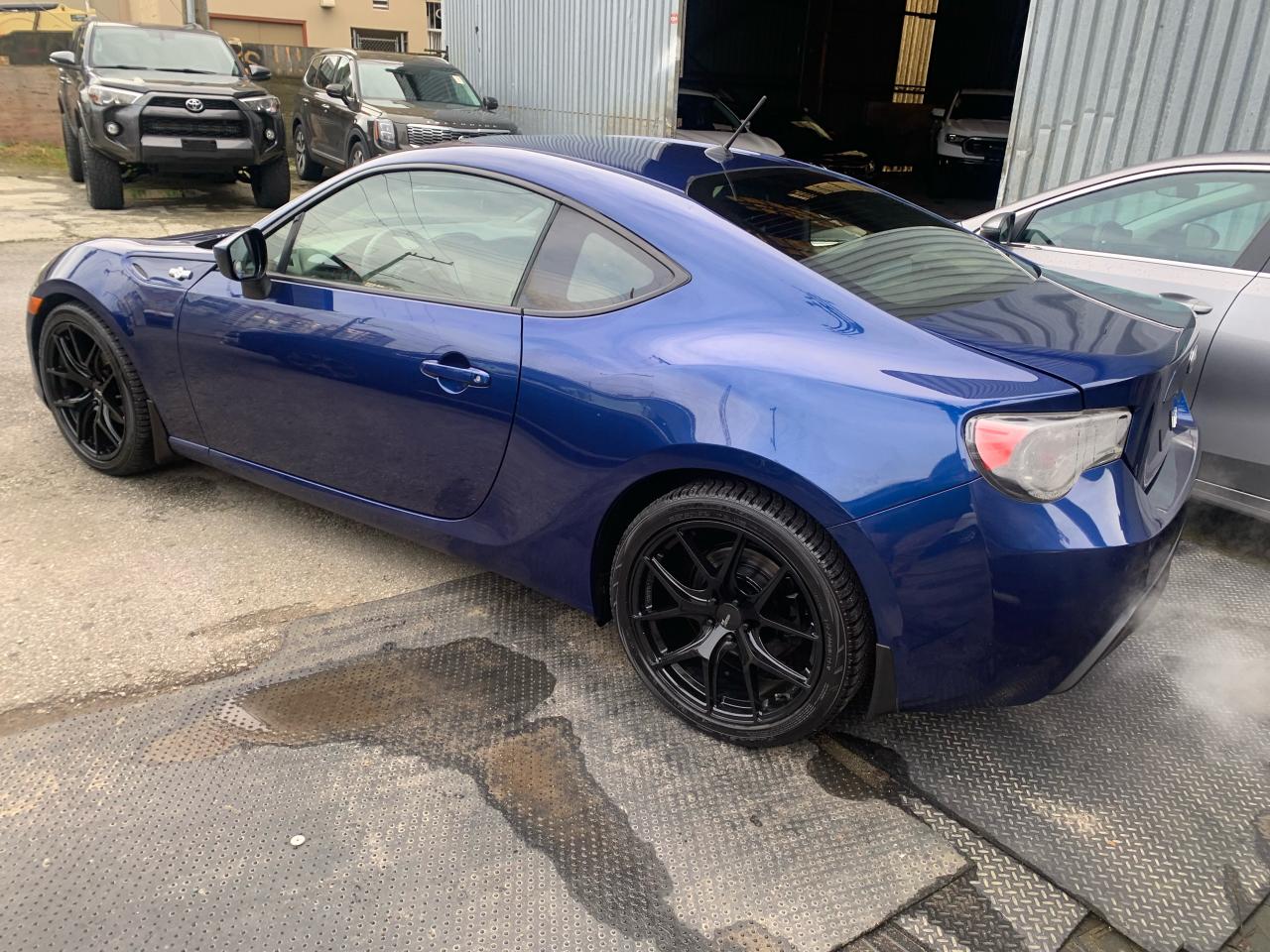 <p>Please check out our website <a href=https://milani.biz/>https://milani.biz/ </a>for Carfax information.</p><p>Looking for a sporty coupe thats as fun to drive as it is stylish? Feast your eyes on this pre-owned 2013 Scion FR-S Auto, available now at Milani Auto Sales! This rear-wheel-drive coupe is designed to ignite your senses. Its a car that begs to be driven, offering a pure and engaging driving experience thats sure to put a smile on your face every time you get behind the wheel. The Scion FR-S is a testament to driving fun.</p><p>This FR-S is perfect for those who crave a dynamic and responsive ride. With its sleek coupe design, its a head-turner on the road. This Scion will take you from weekend adventures to your daily commute with ease.</p><p>Here are five features that will have you itching to get behind the wheel:</p><ul><li><strong>Rear-Wheel Drive:</strong> Experience the thrill of true driving dynamics, offering exceptional handling and control.</li><li><strong>Sporty Coupe Design:</strong> Make a statement with a sleek and eye-catching exterior that turns heads wherever you go.</li><li><strong>Automatic Transmission:</strong> Offers smooth gear changes and a convenient driving experience.</li><li><strong>Fuel Efficient:</strong> Save money at the pump without sacrificing performance.</li><li><strong>2-Door Design:</strong> Emphasizing its sporty, driver-focused personality.</li></ul><p><strong><em>Powered by AutoIntelligence&trade;</em></strong> Vehicle information has been generated using artificial intelligence and is provided for informational purposes only. While efforts are made to ensure accuracy, please confirm all details directly with the dealer.</p>