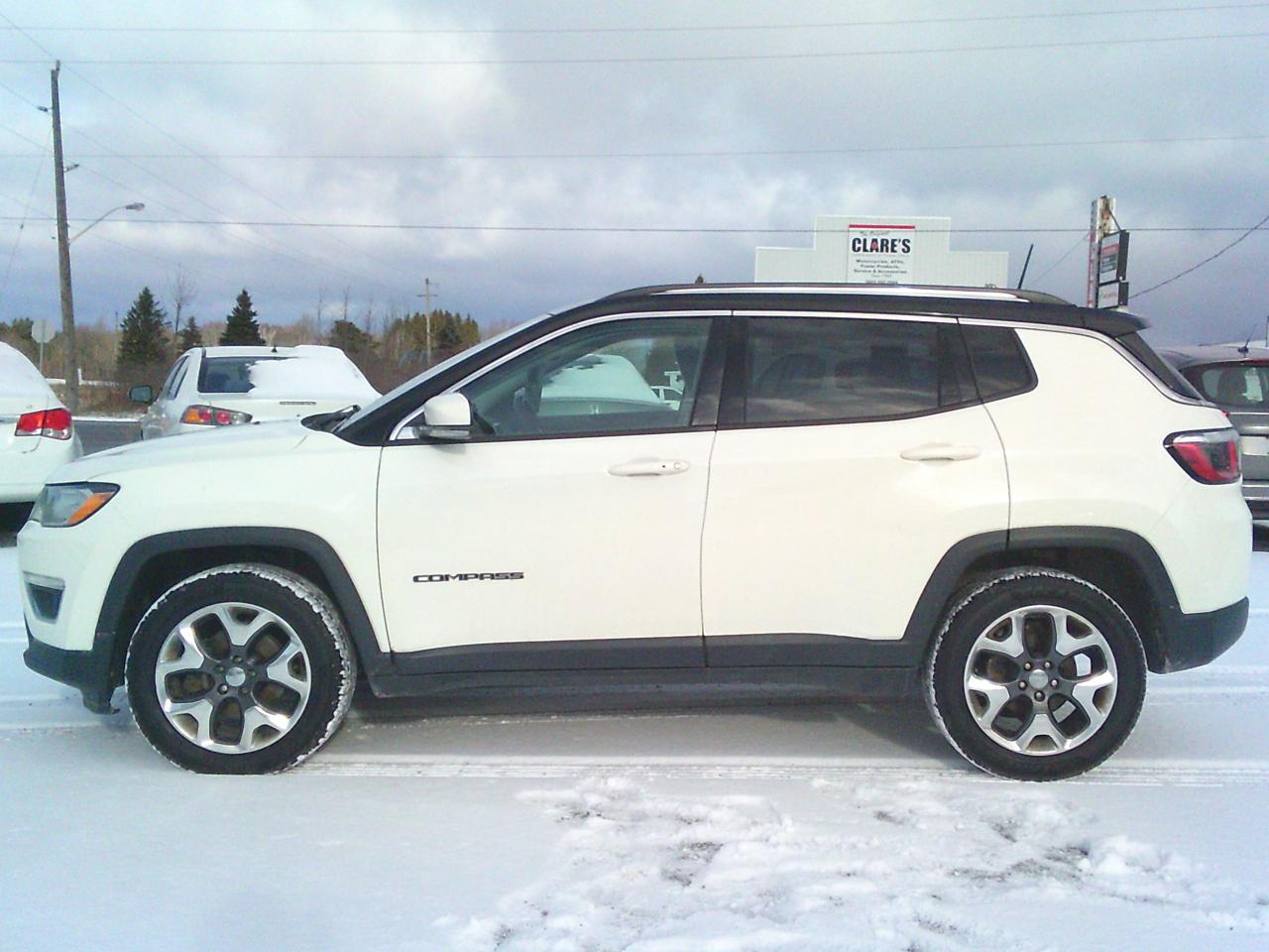 ONE OWNER+CLEAN Carfax, Safety, warranty. All service records from Chrysler Dealer. Trades are welcome. Need financing? No problem, we deal with many financial companies that can help buyers finance the vehicle they want! Any credit welcome. We now offer FREE vehicle delivery anywhere in the Niagara Region! Buy Ahead And Pickup From Our Location Or Have It Shipped Directly To Your Door! Ask Us Today!
 Japanese Sport Car has been serving Canadians for over 25 years, and we strive to provide the best service possible to customers all over Canada! BUY WITH CONFIDENCE! OMVIC & UCDA Registered dealer, specializing in Commercial Trucks for over 25 years!

Full specs & features
2019 Jeep Compass
Trim 
Limited
Powertrain 
Auto, 4WD, 2.4L 4cyl, Gas
Odometer 
212,XXX KM
Exterior/interior colour 
White / Black
5 Seats 
4 Doors 
3C4NJDCBXKT639676

Power Seats
Power Liftgate
Power Windows
Power Locks
Power Mirrors
Heated Seats
Rear View Camera
Bluetooth
4WD Road Conditions Options
Heated Steering Wheel
Beats Sound System
Remote Start
Air Conditioning
Keyless Entry
Navigation
Leather
Has Books
TPMS System

We offer a comprehensive Client Care Package for only $799 which includes a certified safety inspection and a 2-year Silver Powertrain Warranty with UNLIMITED kilometers giving you confidence and coverage from day one. All prices do not include certification, applicable taxes (HST) and licensing fees. Without certification, as per OMVIC regulations, the vehicle is not road worthy, not E-tested, nor certified.