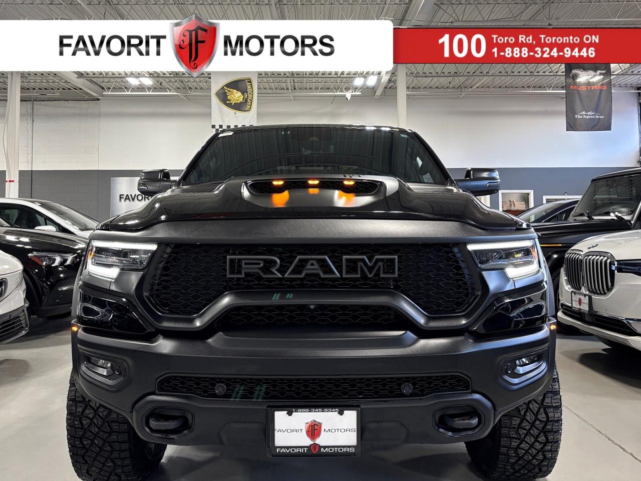 **NEW-YEAR SPECIAL!** FEATURING : 6.2L V8 HEMI SUPERCHARGED, BILSTEIN TRX BLACKHAWK E2 SHOCKS WITH ACTIVE TERRAIN DYNAMICS, 4X4, S&B COLD AIR INTAKE, MIGHTYMOUSE CATCHCAN, HOOD SCOOP, HEADS UP DISPLAY, RAM LED HEADLIGHTS, SIDE STEPS, BEDLINER, BED DIVIDER, TRUCKHERO BAKFLIP MX4 TONNEAU COVER, PADDLE SHIFTERS, PERFORMANCE PAGES, PERFORMANCE DISPLAYS, RACE OPTIONS, LAUNCH CONTROL, MULTI DRIVE MODES, REMOTE START, REMOTE TAILGATE, TRAILER STEERING, HIGHLY LOADED, EXTREMELY CLEAN! FINISHED IN BLACK ON MATCHING BLACK INTERIOR, RED STITCHED LEATHER SEATS, SUEDE INTERIOR TRIMS, HEATED/COOLED SEATS, REAR HEATED/COOLED SEATS, HEATED STEERING WHEEL, HEATED MIRRORS, NAVIGATION SYSTEM, 360 MULTI VIEW BACKUP CAMERA, PARKING SENSORS, AUTOMATIC EMERGENCY BRAKING, LANESENSE, BLIND SPOT ALERT, AM, FM, SATELLITE, AUX, ALEXA, ANDROIDAUTO, BLUETOOTH, STEERING WHEEL CONTROLS, PREMIUM HARMAN/KARDON SOUND SYSTEM, POWER OPTIONS, WEATHERPROOF FLOORMATS, PANORAMIC ROOF, POWER FOLDING MIRRORS, AND MUCH MORE!!!


**As per OMVIC regulations, this vehicle is not drivable, not certified and not e-tested. Certification is available for $899.** All our vehicles are in excellent condition and have been fully inspected by an in-house licensed mechanic.


The advertised price is a finance only price, if you wish to purchase the vehicle for cash additional $2,000 surcharge will apply. Applicable prices and special offers are subject to change with or without notice and shall be at the full discretion of Favorit Motors.