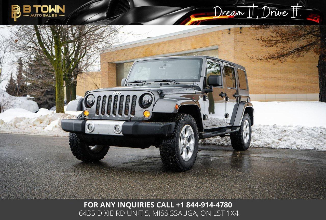 2014 Jeep Wrangler Unlimited Sahara Photo0