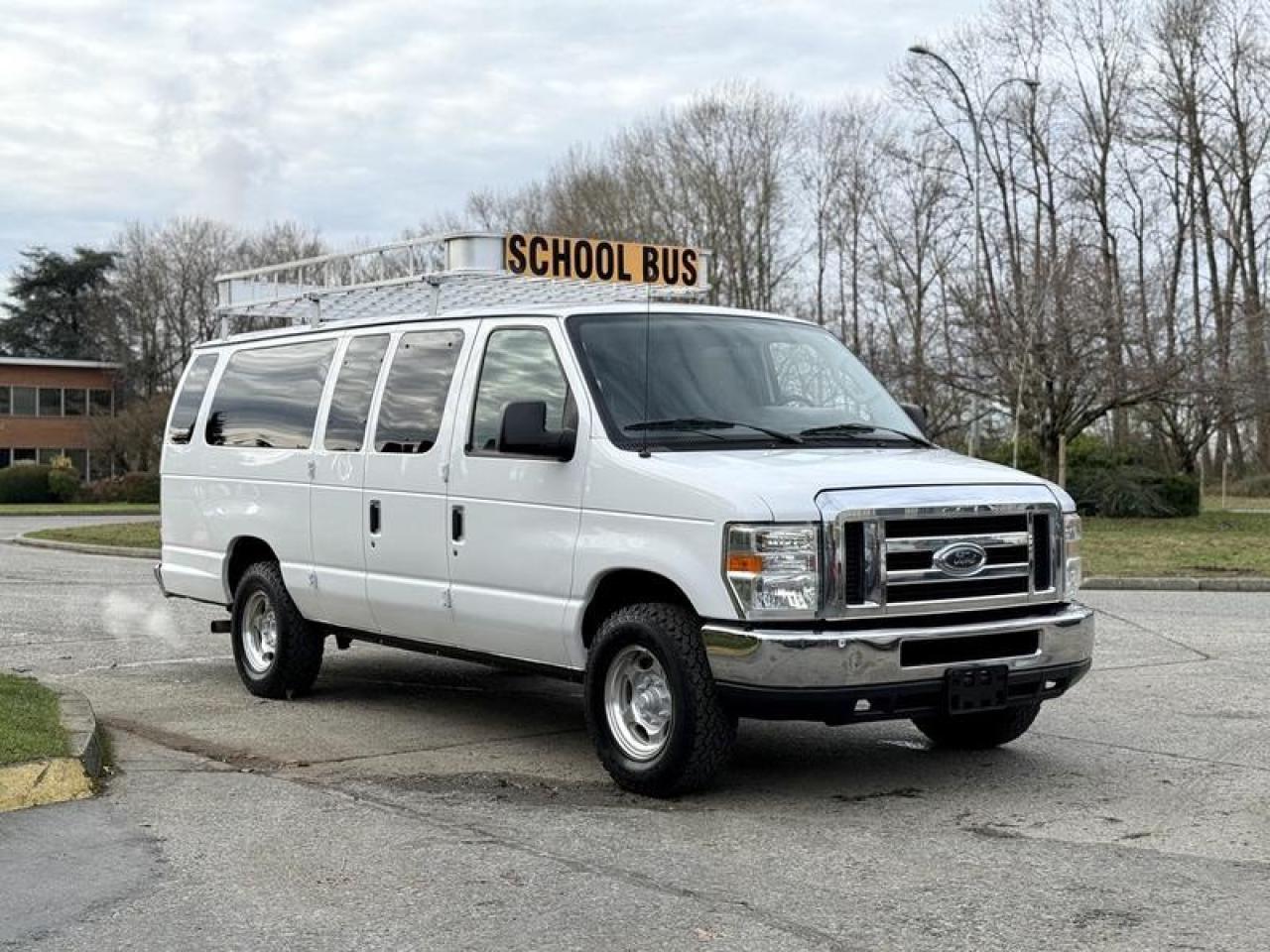 This 2010 Ford Econoline E-350 XLT Super Duty is a full-size 15-passenger van (including driver) powered by a 5.4L V8 engine paired with an automatic transmission and rear-wheel drive. It is equipped with front and rear air conditioning and heat, cruise control, and an AM/FM radio with CD player. Additional features include power windows, power door locks, power mirrors, a roof rack, and rear ladder. Finished in white with a grey cloth interior, this van is configured for passenger transport and group use applications.  $24,380.00 plus $375 processing fee, $24,755.00 total payment obligation before taxes.  Listing report, warranty, contract commitment cancellation fee, financing available on approved credit (some limitations and exceptions may apply). All above specifications and information is considered to be accurate but is not guaranteed and no opinion or advice is given as to whether this item should be purchased. We do not allow test drives due to theft, fraud, acts of vandalism and undetectable impaired driving. Instead we provide the following benefits: Complimentary Warranty (with options to extend), Limited Money Back Satisfaction Guarantee on Fully Completed Contracts, Contract Commitment Cancellation, and an Open-Ended Sell-Back Option. Ask seller for details or call 604-522-REPO(7376) to confirm listing availability.