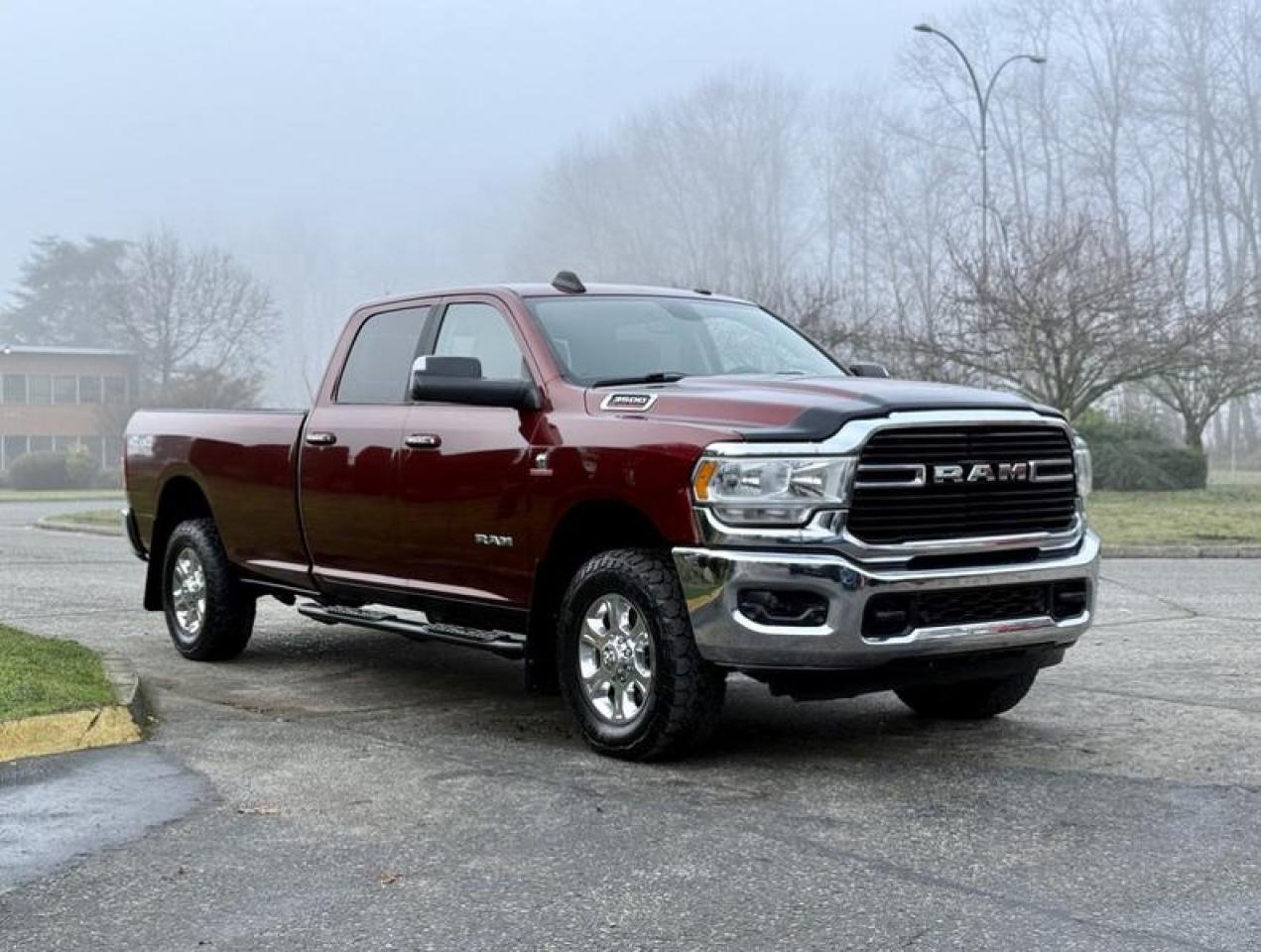 This 2019 RAM 3500 Heavy Duty Big Horn 4x4 is powered by a 6.7L Cummins turbo diesel inline-6 paired with an automatic transmission and four-wheel drive, configured with a crew cab and an 8-foot long bed. The truck is equipped with a trailer brake controller, tow/haul mode, front and rear parking sensors, and a reverse camera, making it suitable for towing and work-focused applications. Interior features include heated seats, a heated steering wheel, push-button start, AM/FM radio with Bluetooth, USB and USB-C inputs, power windows, power door locks, power mirrors, air conditioning and heat, and a power sunroof. Finished in red with a grey cloth interior, this RAM 3500 measures approximately 21 ft 9 in long, 6 ft 11 in wide, and 6 ft 8 in high, offering a full-size heavy-duty pickup configured for both on-road comfort and job-site capability. This item is currently OFFSITE. You must register an appointment with our office to schedule an offsite viewing. Appointments must be made a minimum of one business day in advance (and as defined by the days that Repo.com is open for business) before your appointment can be scheduled and confirmed. We may, at our own discretion, instead opt to transport smaller items to Repo.coms main yard for viewing purposes.  $52,820.00 plus $375 processing fee, $53,195.00 total payment obligation before taxes.  Listing report, warranty, contract commitment cancellation fee, financing available on approved credit (some limitations and exceptions may apply). All above specifications and information is considered to be accurate but is not guaranteed and no opinion or advice is given as to whether this item should be purchased. We do not allow test drives due to theft, fraud, acts of vandalism and undetectable impaired driving. Instead we provide the following benefits: Complimentary Warranty (with options to extend), Limited Money Back Satisfaction Guarantee on Fully Completed Contracts, Contract Commitment Cancellation, and an Open-Ended Sell-Back Option. Ask seller for details or call 604-522-REPO(7376) to confirm listing availability.