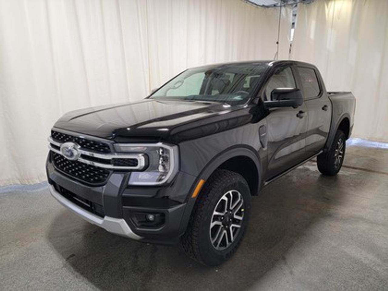 This all-new 2026 Ford Ranger Lariat 500A looks absolutely stunning in Shadow Black. This versatile compact pickup comes equipped with the 2.3L EcoBoost® engine, producing 270 horsepower and 310 lb-ft of torque. By leveraging EcoBoost® technology and a 10-speed automatic transmission, this truck is designed to achieve 11.2L/100 km (25 miles per gallon) combined highway/city fuel economy.

This vehicle comes with the All-Weather Packageready to take on any season!
Snow, rain, mud, or sunshinethis vehicle is built for it all! The All-Weather Package adds extra protection where it matters most, with premium mud flaps to shield your paint from road debris, all-weather floor mats to protect your interior from lifes messes, and Xpel paint protection to help guard against those infuriating rock chips. Drive with confidence, knowing your investment is protected from Regina's elements.

Key Features:
12 Centre Display
Dual Zone Temperature Control 
Rear Window W/Privacy Glass & Defrost
Ford Co-Pilot360
360 Degree Camera
Lane Keeping System 
Rear Parking Sensors
Adaptive Cruise Control and Speed Sign Recognition
Reverse Break Assist 
B&O® System by Bang & Olufsen with HD Radio
Intelligent Access with Push-Button Start
10-Way Power Drivers Seat 
Heated Front Seats 
17 Grey Painted Aluminum Wheels
Cruise Control
Universal Garage Door Opener
FordPass Connect
Selectable Drive Modes
12 Cluster Display
Engine Block Heater

Bennett Dunlop Ford, proudly serving Regina for over 40 years, is conveniently located at 770 Broad Street. With over 3,500 Google reviews, our reputation reflects our commitment to providing a fast, easy, and enjoyable vehicle-buying experience. We eliminate the hassle with no admin or documentation fees, transparent upfront pricing that lets you shop with total confidence. But were more than just a dealershipwere driven to make a difference by supporting local community initiatives and events that matter to you. Visit Bennett Dunlop Ford today and experience why were Reginas trusted choice for quality vehicles, exceptional service, and a genuine commitment to driving change in our community!
