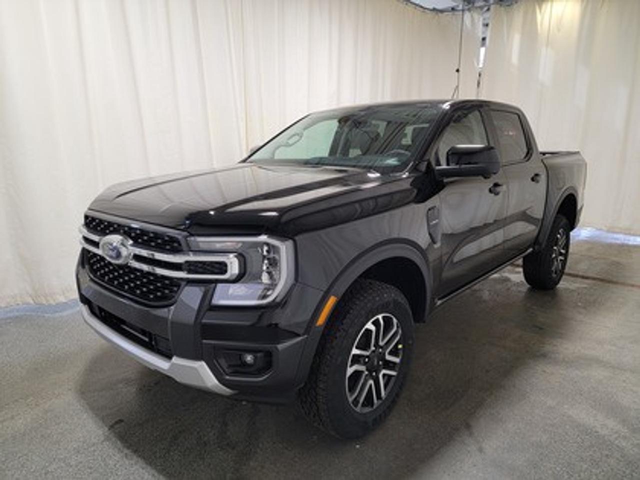 This all-new 2026 Ford Ranger Lariat 500A looks absolutely stunning in Shadow Black. This versatile compact pickup comes equipped with the 2.3L EcoBoost® engine, producing 270 horsepower and 310 lb-ft of torque. By leveraging EcoBoost® technology and a 10-speed automatic transmission, this truck is designed to achieve 11.2L/100 km (25 miles per gallon) combined highway/city fuel economy.

This vehicle comes with the All-Weather Packageready to take on any season!
Snow, rain, mud, or sunshinethis vehicle is built for it all! The All-Weather Package adds extra protection where it matters most, with premium mud flaps to shield your paint from road debris, all-weather floor mats to protect your interior from lifes messes, and Xpel paint protection to help guard against those infuriating rock chips. Drive with confidence, knowing your investment is protected from Regina's elements.

Key Features:
12 Centre Display
Dual Zone Temperature Control 
Rear Window W/Privacy Glass & Defrost
Ford Co-Pilot360
360 Degree Camera
Lane Keeping System 
Rear Parking Sensors
Adaptive Cruise Control and Speed Sign Recognition
Reverse Break Assist 
B&O® System by Bang & Olufsen with HD Radio
Intelligent Access with Push-Button Start
10-Way Power Drivers Seat 
Heated Front Seats 
17 Grey Painted Aluminum Wheels
Cruise Control
Universal Garage Door Opener
FordPass Connect
Selectable Drive Modes
12 Cluster Display
Engine Block Heater

Bennett Dunlop Ford, proudly serving Regina for over 40 years, is conveniently located at 770 Broad Street. With over 3,500 Google reviews, our reputation reflects our commitment to providing a fast, easy, and enjoyable vehicle-buying experience. We eliminate the hassle with no admin or documentation fees, transparent upfront pricing that lets you shop with total confidence. But were more than just a dealershipwere driven to make a difference by supporting local community initiatives and events that matter to you. Visit Bennett Dunlop Ford today and experience why were Reginas trusted choice for quality vehicles, exceptional service, and a genuine commitment to driving change in our community!