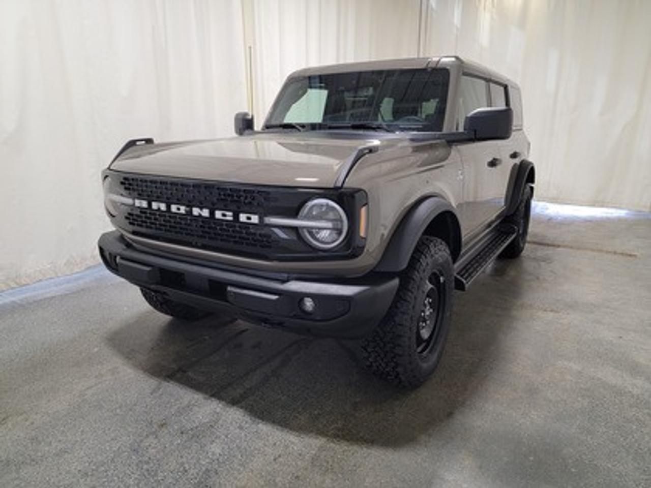 The 2026 Ford Bronco Outer Banks 314A Luxury Package looks absolutely stunning in Marsh Grey. Sporting an aggressive stance and a rugged, yet refined design, this full-sized 5-passenger SUV is powered by a 2.3L EcoBoost® engine producing 270 horsepower and 309 lb-ft of torque. Paired with a 10-speed automatic transmission, the Bronco Outer Banks delivers smooth power delivery and engaging driving experience, whether youre navigating city streets or tackling off-road trails. With fuel mileage rated at 12.0L/100 km (24 Mile Per Gallon) combined highway/city.

This vehicle comes with the All-Weather Packageready to take on any season!
Snow, rain, mud, or sunshinethis vehicle is built for it all! The All-Weather Package adds extra protection where it matters most, with premium mud flaps to shield your paint from road debris, all-weather floor mats to protect your interior from lifes messes, and Xpel paint protection to help guard against those infuriating rock chips. Drive with confidence, knowing your investment is protected from Regina's elements.

Key Features:
360-Degree Camera
Adaptive Cruise Control
B&O 12 Speaker Sound System
BLIS® (Blind Spot Information System) with Cross-Traffic Alert
Lane-Keeping System
Pre-Collision Assist with Emergency Braking
Rear View Camera with Backup Assist Grid Lines
Remote Keyless Entry with Push-Button Start
Removable Doors & Roof 
Front Parking Sensors
Wireless Apple CarPlay® and Android Auto
18 Bright Machined Black High Gloss-Painted Aluminum Wheels
Dual-Zone Electronic Automatic Temperature Control with Air Conditioning
Ford Co-Pilot 360
Lane Keeping Assist 
FordPass Connect with Remote Start
SYNC® 4 W/Information on Demand
Terrain Management System with G.O.A.T. Modes 
4X4 Capability for off-road adventure
Black Appearance Package
Engine Block Heater

Bennett Dunlop Ford, proudly serving Regina for over 40 years, is conveniently located at 770 Broad Street. With over 3,500 Google reviews, our reputation reflects our commitment to providing a fast, easy, and enjoyable vehicle-buying experience. We eliminate the hassle with no admin or documentation fees, transparent upfront pricing lets you shop with total confidence. But were more than just a dealershipwere driven to make a difference by supporting local community initiatives and events that matter to you. Visit Bennett Dunlop Ford today and experience why were Reginas trusted choice for quality vehicles, exceptional service, and a genuine commitment to driving change in our community!