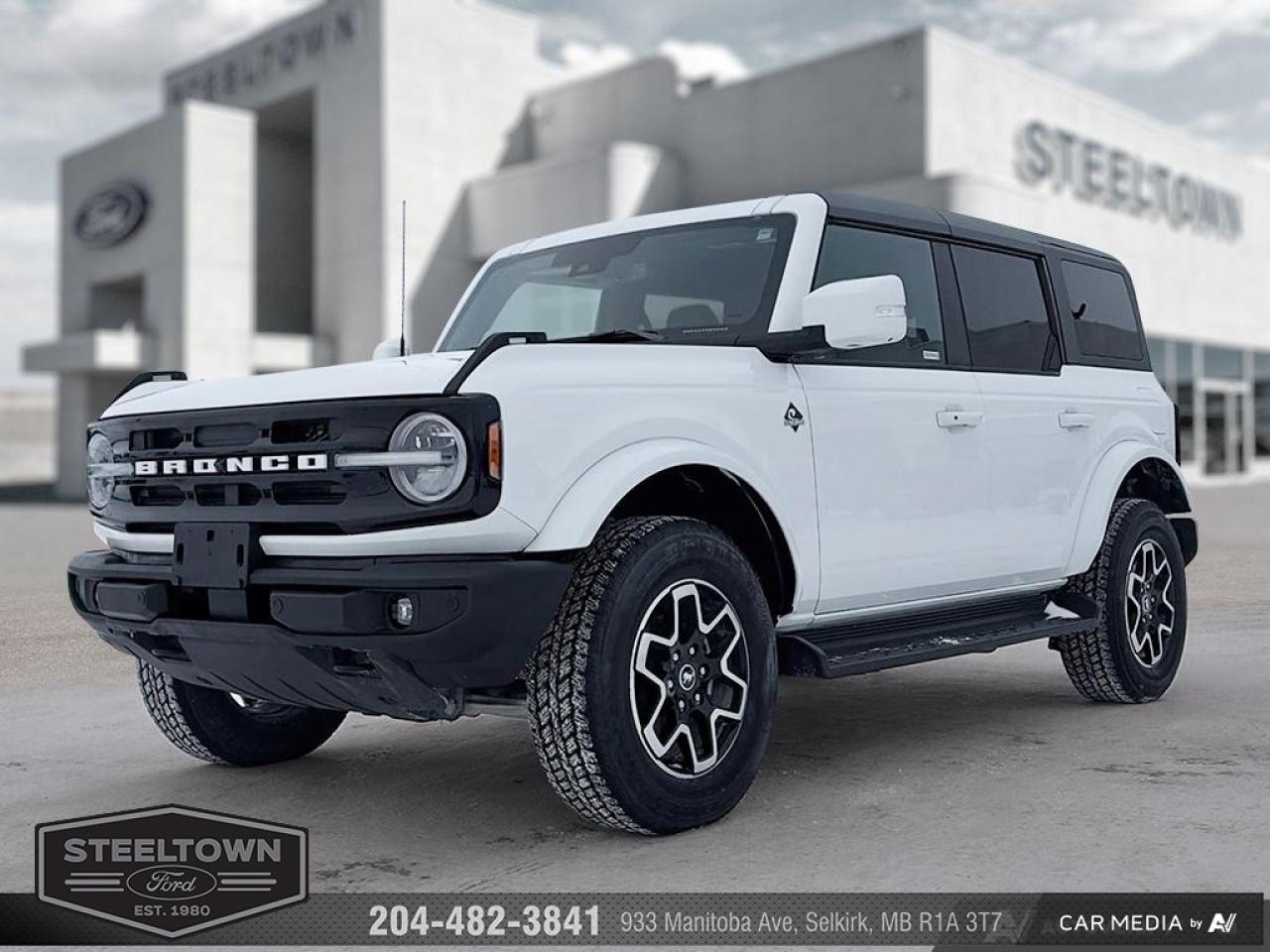 <b>Low Mileage, Navigation,  Heated Seats,  Remote Start,  Blind Spot Detection,  Lane Keep Assist!</b><br> <br> We value your TIME, we wont waste it or your gas is on us!   We offer extended test drives and if you cant make it out to us we will come straight to you!<br><br><br> <br>Not only is this 2025 Ford Bronco a cool and capable off-roader, but its also incredibly satisfying to drive every day. This 2025 Ford Bronco is for sale today in Selkirk. <br> <br>With a nostalgia-inducing design along with remarkable on-road driving manners with supreme off-road capability, this 2025 Ford Bronco is indeed a jack of all trades and masters every one of them. Durable build materials and functional engineering coupled with modern day infotainment and driver assistive features ensure that this iconic vehicle takes on whatever you can throw at it. This low mileage SUV has just 4,063 km. Its nice in colour and is completely accident free based on the <a href=https://vhr.carfax.ca/?id=fc0ZPLcZpzh2RsL5rQGN3L6qJpayGyDM target=_blank>CARFAX Report</a>. It has an Automatic transmission and is powered by a 275HP 2.3L 4 Cylinder Engine. <br> <br> Our Broncos trim level is Outer Banks. This Bronco Outer Banks takes things to a whole new level, with polished aluminum wheels, body colored fender flares, door handles and power heated side mirrors, along with LED headlights with high beam assist, front fog lights, and upgraded LED brake lights. This rugged off-roader also treats you with amazing comfort and connectivity features that include heated front seats, remote engine start, dual-zone climate control, front and rear cupholders, and an upgraded infotainment system with Apple CarPlay, Android Auto, SiriusXM and inbuilt navigation, to get you back home from your off-road adventures. Road safety is assured thanks to a suite of systems including blind spot detection, pre-collision assist with pedestrian detection and cross-traffic alert, lane keeping assist with lane departure warning, rear parking sensors, and driver monitoring alert. Additional features include proximity keyless entry with push button start, trail control, trail turn assist, and so much more. This vehicle has been upgraded with the following features: Navigation, Heated Seats, Remote Start, Blind Spot Detection, Lane Keep Assist, Aluminum Wheels, Sunroof.<br> To view the original window sticker for this vehicle view this <a href=http://www.windowsticker.forddirect.com/windowsticker.pdf?vin=1FMDE8BH5SLA58591 target=_blank>http://www.windowsticker.forddirect.com/windowsticker.pdf?vin=1FMDE8BH5SLA58591</a>. <br/><br> <br>To apply right now for financing use this link: <a href=http://www.steeltownford.com/?https://CreditOnline.dealertrack.ca/Web/Default.aspx?Token=bf62ebad-31a4-49e3-93be-9b163c26b54c&La target=_blank>http://www.steeltownford.com/?https://CreditOnline.dealertrack.ca/Web/Default.aspx?Token=bf62ebad-31a4-49e3-93be-9b163c26b54c&La</a><br><br> <br/><br>Family owned and operated in Selkirk for 35 Years.  <br>Steeltown Ford is located just 20 minutes North of the Perimeter Hwy, with an onsite banking center that offers free consultations. <br>Ask about our special dealer rates available through all major banks and credit unions.<br><br><br>Steeltown Ford Protect Plus includes:<br>- Life Time Tire Warranty <br>Cars cost less in Selkirk <br><br>Dealer Permit # 1039<br><br><br> Come by and check out our fleet of 100+ used cars and trucks and 140+ new cars and trucks for sale in Selkirk.  o~o