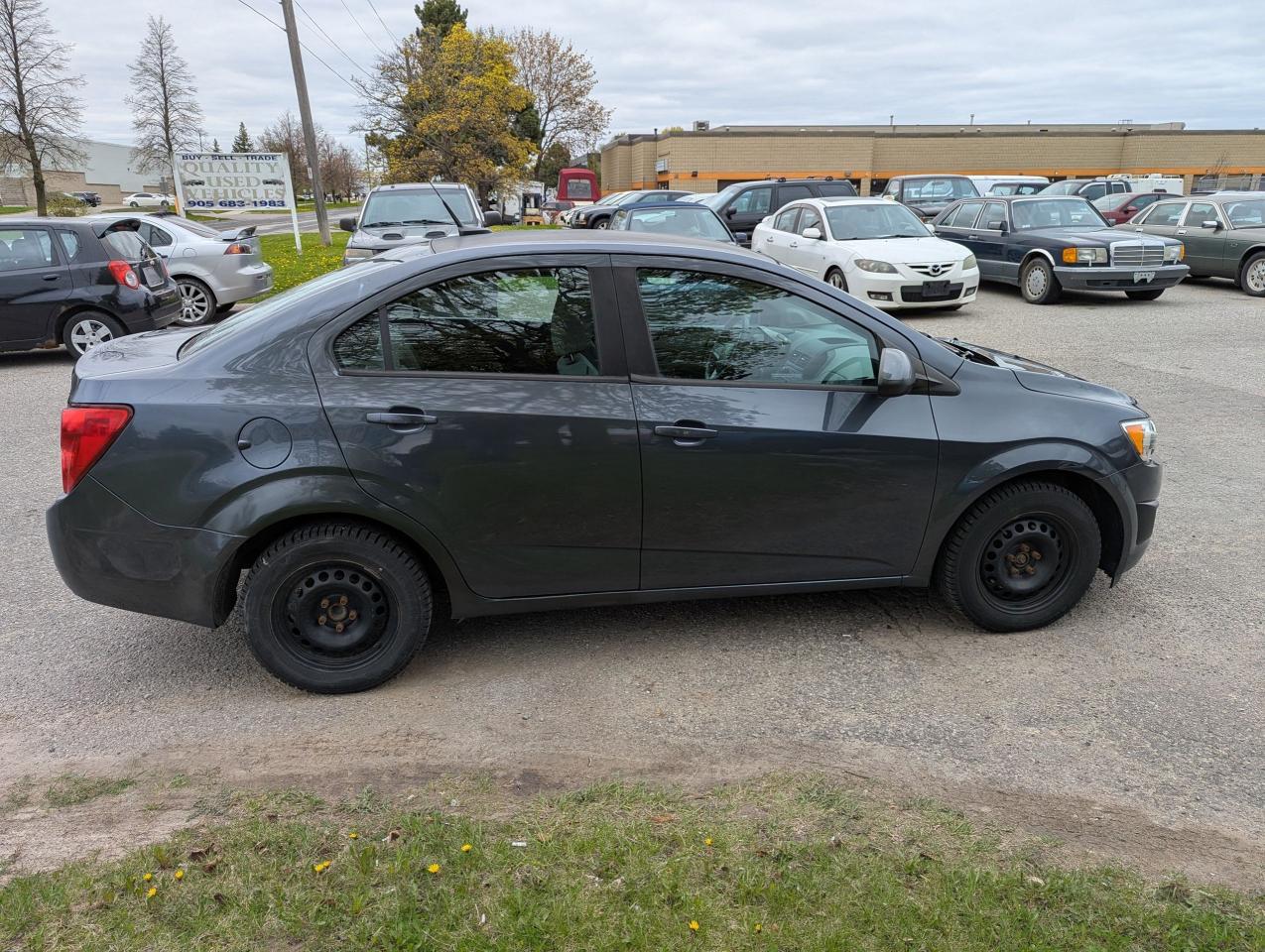 2013 Chevrolet Sonic "Gas MISER" certified + FREE 6M warranty Photo2