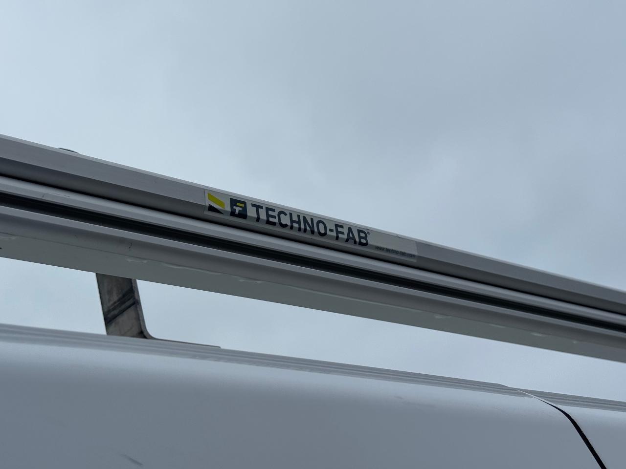 2023 Ford Transit Cargo Van T-150 130" Low Rf 8670 GVWR RWD **LADDER RACKS** Photo