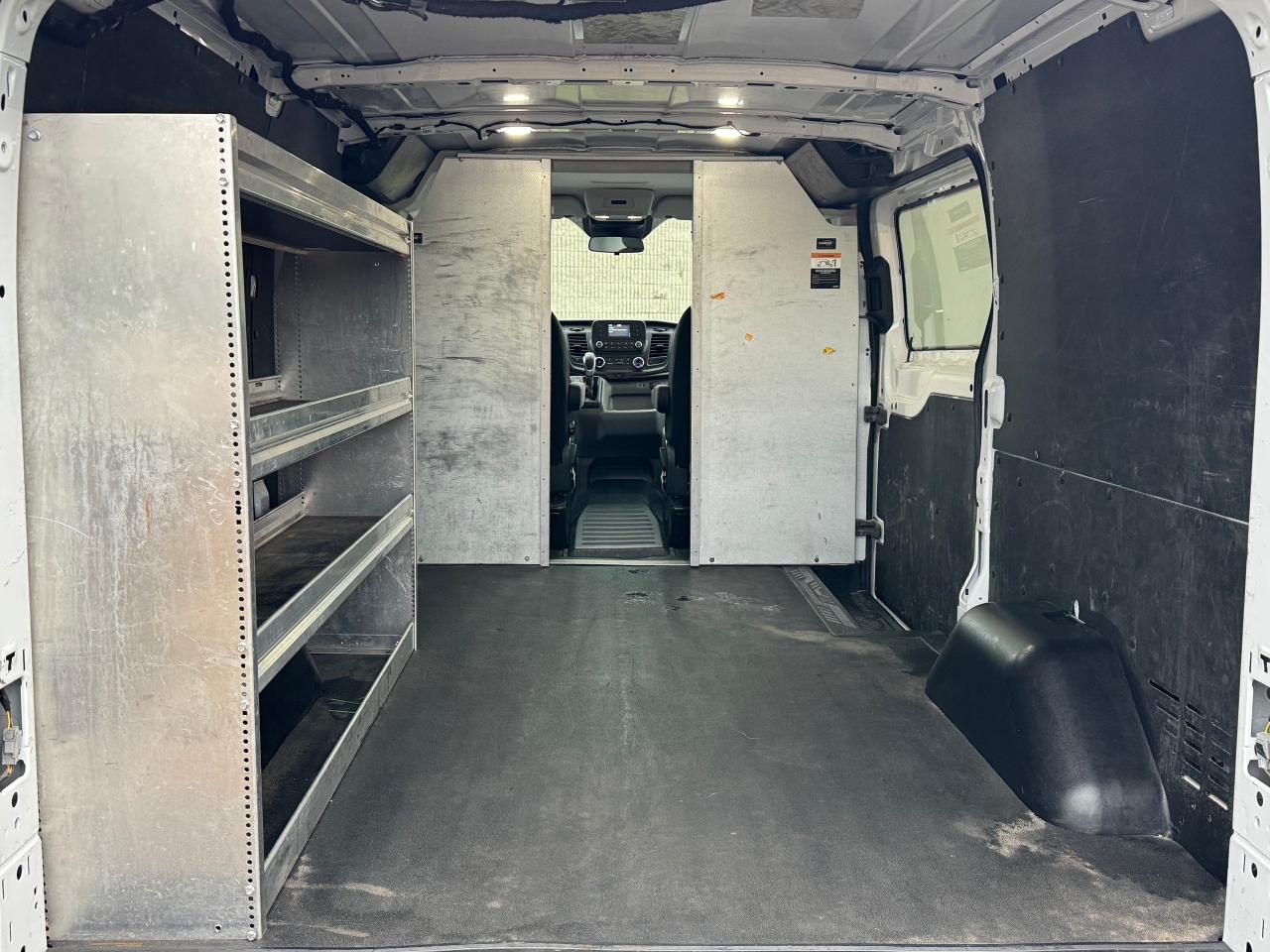 2023 Ford Transit Cargo Van T-150 130" Low Rf 8670 GVWR RWD **LADDER RACKS** Photo