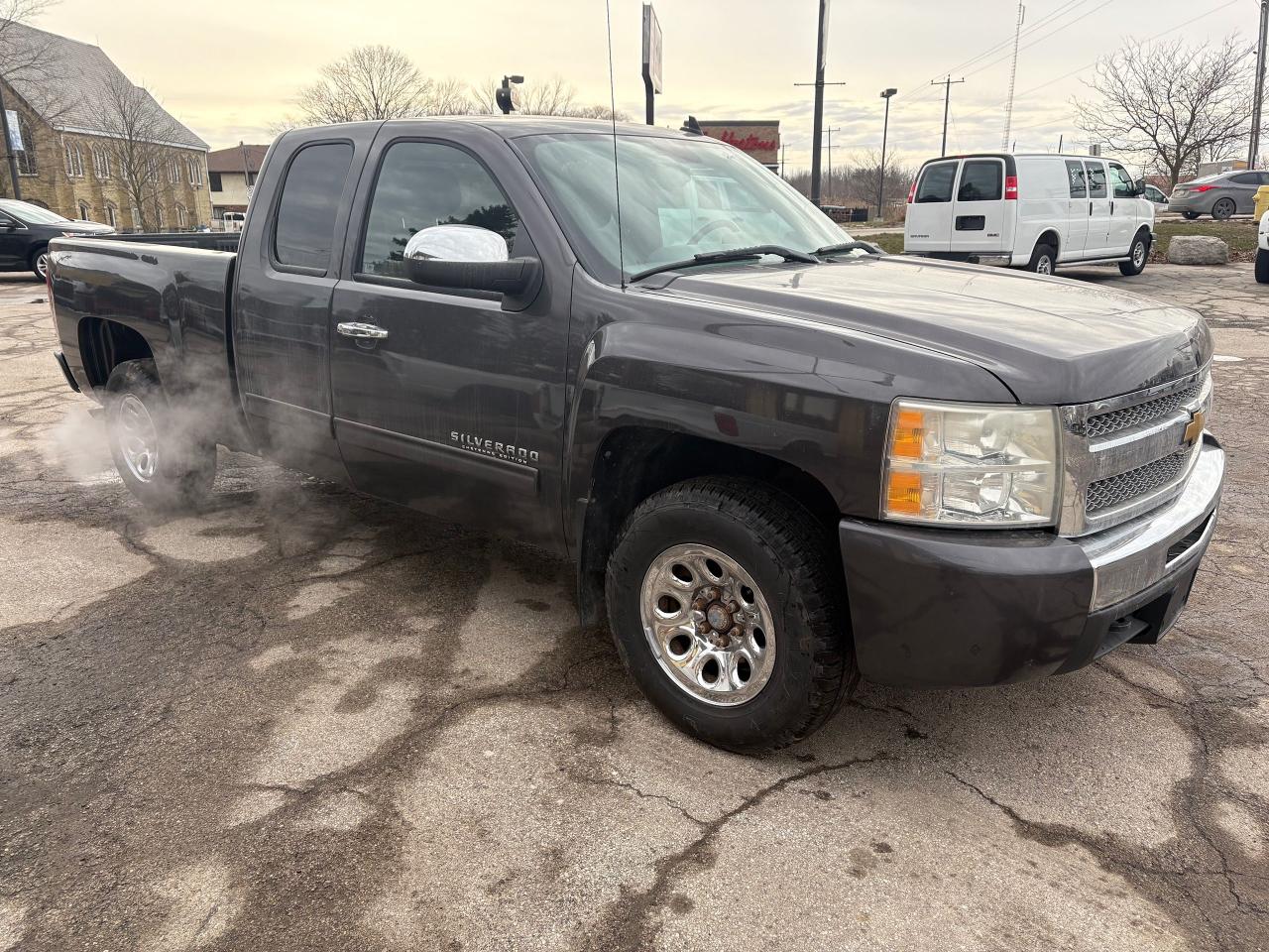 2011 Chevrolet Silverado 1500 4WD EXT CAB 143.5" LS CHEYENNE EDITION Photo