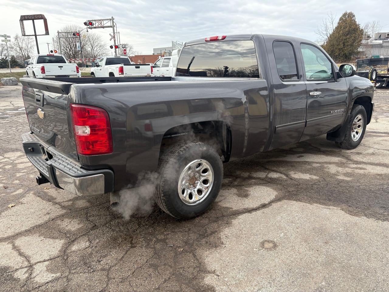 2011 Chevrolet Silverado 1500 4WD EXT CAB 143.5" LS CHEYENNE EDITION Photo