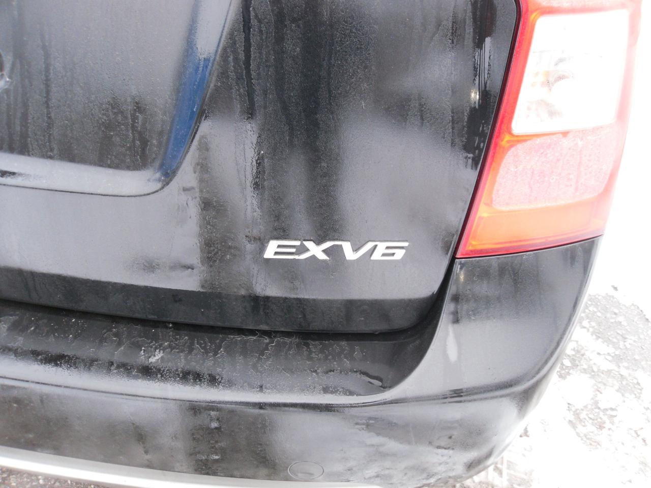 2012 Kia Rondo 4dr Wgn V6 EX w/3rd Row Photo3