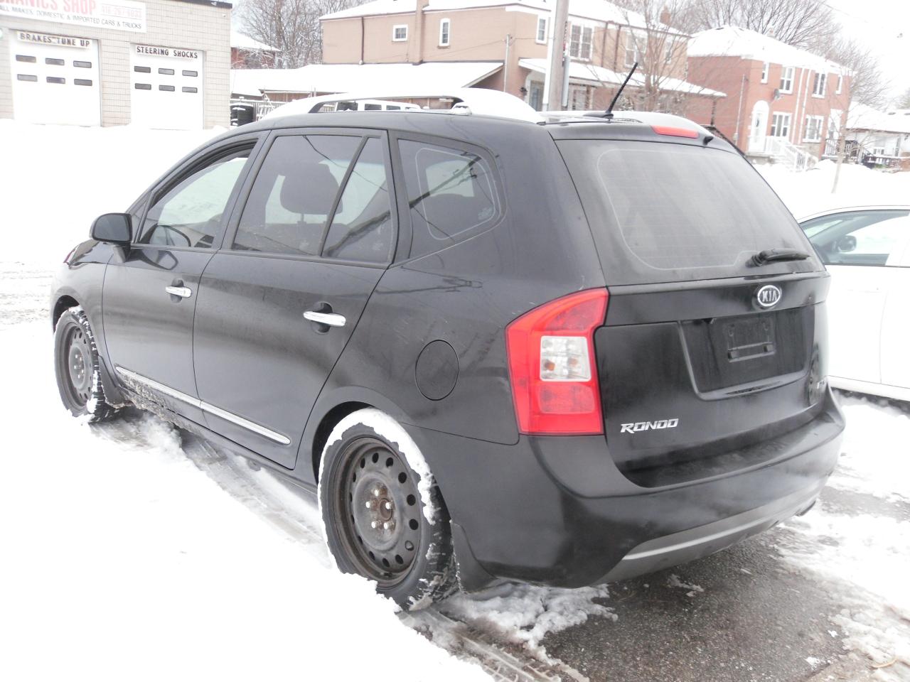 2012 Kia Rondo 4dr Wgn V6 EX w/3rd Row Photo4