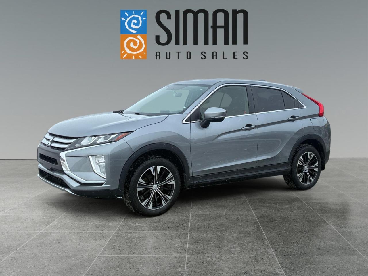 <p>Discover the perfect blend of modern technology and reliable performance with this<strong>2018 Mitsubishi Eclipse Cross AWC</strong>. Designed with a sporty, forward-leaning silhouette, this compact SUV is built to handle everything Saskatchewan weather throws your way.</p>

<p>With only<strong>98,000 kms</strong>, this vehicle is just getting started. It comes equipped with Mitsubishis legendary<strong>All-Wheel Control (AWC)</strong>system, providing exceptional stability and traction on slippery, snow-covered roads. Inside, youll find a driver-oriented cockpit featuring<strong>heated front seats</strong>to keep you warm during cold commutes and a high-definition<strong>back-up camera</strong>for effortless parking and safety.</p>

<p>At<strong><a href=https://www.simanautosales.com/ target=_blank>Siman Auto Sales</a></strong>, we have been a<a href=https://www.simanautosales.com/about/ target=_blank>proudly family-run Regina business for over 25 years</a>. We are dedicated to providing a transparent experience, which is why we offer:</p>

<ul>
 <li><strong>Trade-In Acceptance:</strong>We make it easy to upgrade by accepting all trades.</li>
 <li><strong>Comprehensive Warranties:</strong>Every vehicle we sell comes with warranty options for your peace of mind.</li>
 <li><strong>Quality Inspections:</strong>Our vehicles undergo a rigorous reconditioning process before hitting the lot.</li>
</ul>

<p>Experience the confidence of the Eclipse Cross for yourself. Visit us at<strong>Siman Auto Sales</strong>at 1810 - 2nd Avenue North, Regina, to<a href=https://www.simanautosales.com/regina-location/ target=_blank>book your test drive today</a>.</p>