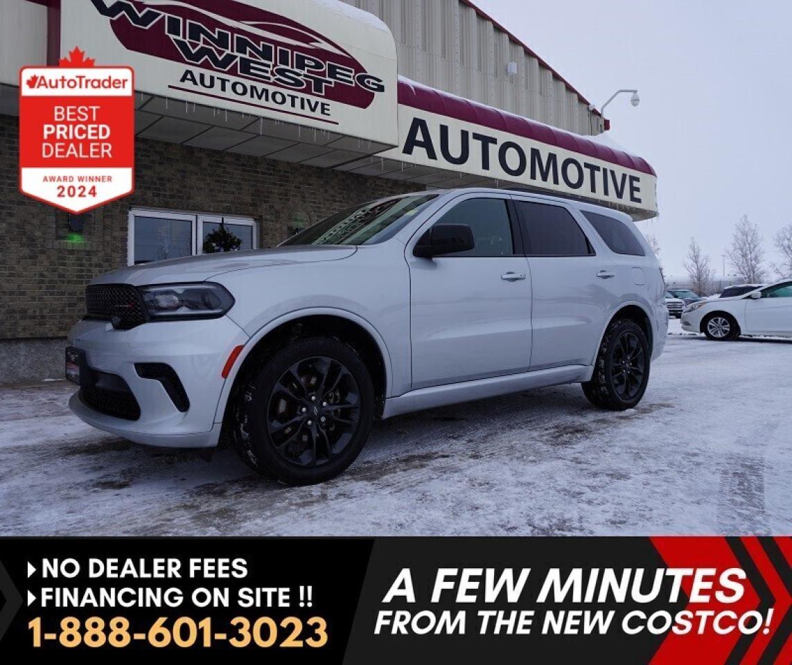 *** Dealer arranged financing on site! Quick, Simple,  no calls or waiting on bank appointments required!! Drive away today ***   NO ADMINISTRATION FEES!!

2023 Dodge Durango SXT AWD | Blacktop | Heated Seats | 7 Passenger | Low KMs 

Stand out in this 2023 Dodge Durango SXT AWD, finished in stunning Triple Nickel Silver with a Blacktop Package, blackout badging, and a sleek black interior. With only 34,000 kms, this very clean, well-maintained SUV is the perfect mix of style, safety, performance, and versatility.

Built for all-season driving, the All-Wheel Drive (AWD) system delivers confidence in rain, snow, and dry roads, while 3rd-row seating for 7 passengers makes it ideal for families, road trips, and daily driving.

Key Features & Options:

AWD  All Wheel Drive with Blacktop Package

Heated front seats
Heated steering wheel
7-passenger seating
3rd row seating
Power driver seat
Push-button start
Keyless entry
Dual-zone climate control
Large touchscreen display
Apple CarPlay & Android Auto
Bluetooth hands-free
Backup camera
Cruise control
Alloy wheels
Black exterior accents
Blackout badging

Safety & Driver Assistance:

Forward Collision Warning
Automatic Emergency Braking
Blind Spot Monitoring
Rear Cross-Path Detection
Lane Departure Warning
Electronic Stability Control
Multiple airbags
Tire Pressure Monitoring System

Vehicle Details:

2023 Dodge Durango SXT
Triple Nickel Silver
Black interior
Only 34,000 kms
Clean condition
Car-great
Non-smoker vehicle
Accident-free (if applicable)

This low-kilometer Dodge Durango AWD delivers bold styling, modern technology, advanced safety, and family-friendly space  all wrapped in an aggressive Blacktop look.

Comes with a Manitoba Safety Certification, and we have many Extended Powertrain warrantys available on your vehicle purchase up to 10-year coverage (on eligible vehicles see dealer for details). Financing on site with Zero down financing OAC. Trades accepted. View at Winnipeg West Automotive Group, 5195 Portage Ave. (only a couple of minutes past the new Costco) Dealer permit # 6007, Call now 1(888) 601-3023. This Car is located in Winnipeg Manitoba,  however we can have it shipped anywhere in North America relatively inexpensively.