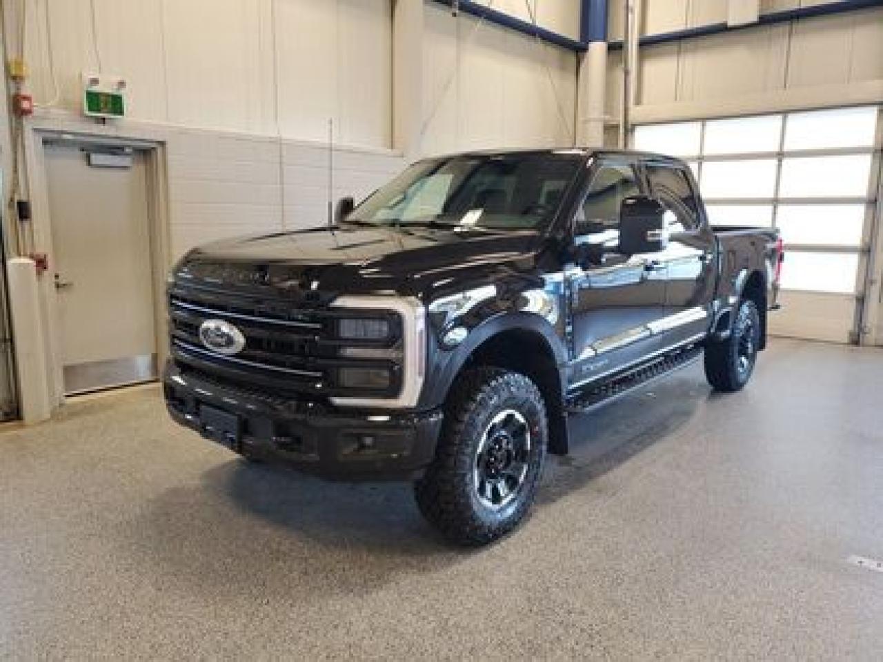 This all new 2026 Ford F-350 Platinum Crew Cab 4X4 713A looks absolutely stunning in Agate Black. This heavy duty picks up comes with the 6.7L Power Stroke Diesel engine. This remarkable engine not only produces 475 horsepower and 1,050 ft pounds of torque, but by leveraging technology and a 10-speed automatic transmission. This truck can tow up to a massive amount of 20,000 pounds!

Key Features:
Adaptive Cruise Control 
Lane Keeping System
Rear View Camera 
Power Tailgate
Wireless Charging Pad
Power Deployable Running Boards
Tailgate Step
Remote Tailgate Release
Heated Steering Wheel
Heated Front & Rear Seats 
Ventilated Front Seats 
Ford Connectivity Package 
12 Productivity Screen  
LED Box Lighting
Driver Memory Seat System
Ford Co-Pilot360 Assist 2.0
360 Degree Camera
Rain Sensing Wipers 
B&O Sound System
Rear Parking Sensors 
Intelligent Access W/ Push Button Start 
Apple CarPlay & Android Auto Compatibility 
Cruise Control 
Remote Keyless Entry
Tremor Off Road Package
Power Moonroof

Moose Jaw Ford, conveniently located at 1010 North Service Road in Moose Jaw, is your trusted destination for all your automotive needs. With an impressive 4.8-star Google rating from nearly 1,500 reviews, we are proud to deliver an exceptional vehicle-buying experience tailored just for you. Our Moose Jaw Motives set us apart, offering unbeatable value like half-priced oil changes for life on pre-owned vehicles, one year of key and remote protection, and one year of tire and rim protection. Enjoy peace of mind with every purchase. At Moose Jaw Ford, were committed to driving positive change in our community by combining exceptional service, high-quality vehicles, and a guest-first approach. Visit us today!