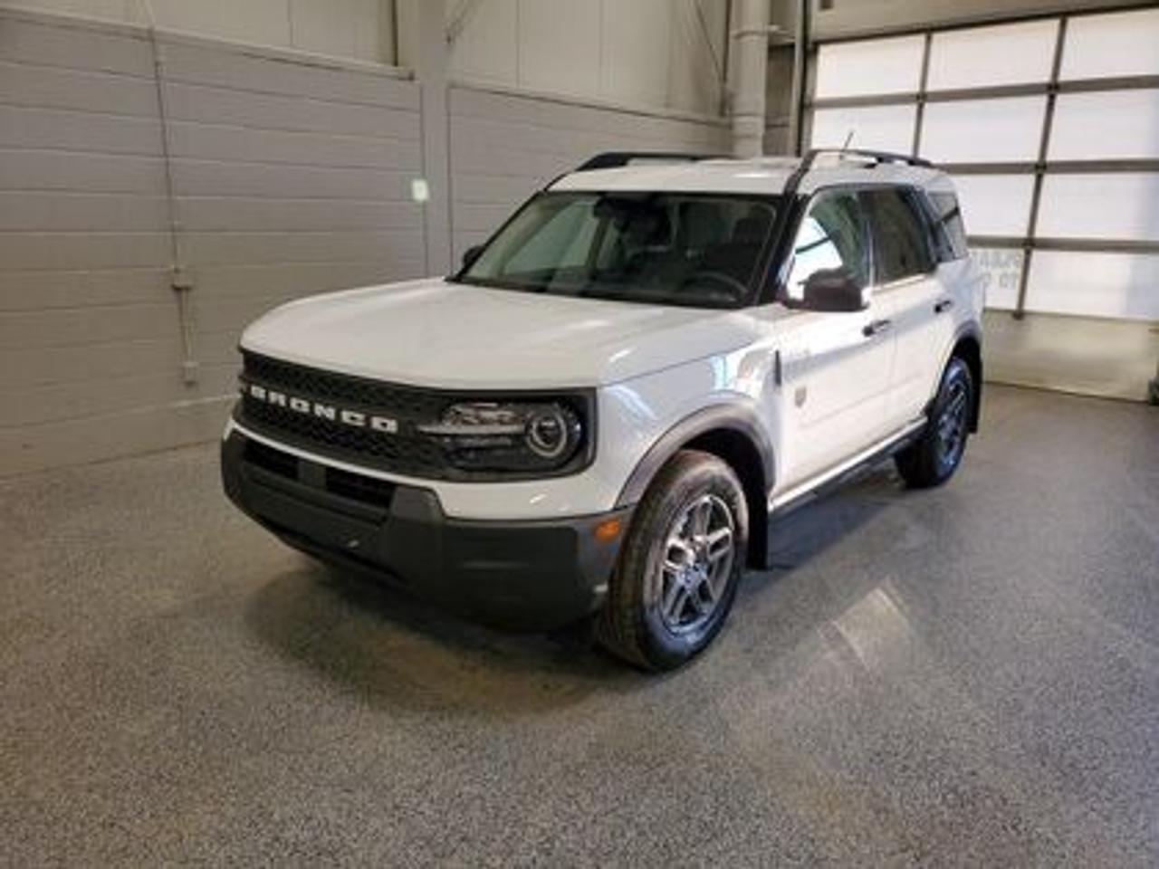 This rugged and refined 2026 Ford Bronco Sport Big Bend 200A stands out in Oxford White. Built to tackle adventure and city streets alike, this 5-passenger SUV is powered by a 1.5L EcoBoost® engine, delivering 181 horsepower and 190 lb-ft of torque. Coupled with an 8-speed automatic transmission, the Bronco Sport offers impressive fuel efficiency and performance to match your lifestyle.

Key Features Include:
Heated Front Seats
13.2 Center Display
8-Way Power Drivers Seat
SYNC® 4 with a 13.2 Color Touchscreen
Ford Co-Pilot360 Assist+ featuring Adaptive Cruise Control with Stop & Go
Terrain Management System with 5 G.O.A.T. Modes
LED Headlamps, Fog Lamps, and Signature Lighting
17 Carbonized Grey-Painted High Gloss Aluminum Wheels
Wireless Apple CarPlay® and Android Auto Compatibility
Privacy Glass
Intelligent Access with Push-Button Start

Moose Jaw Ford, conveniently located at 1010 North Service Road in Moose Jaw, is your trusted destination for all your automotive needs. With an impressive 4.8-star Google rating from nearly 1,500 reviews, we are proud to deliver an exceptional vehicle-buying experience tailored just for you. Our Moose Jaw Motives set us apart, offering unbeatable value like half-priced oil changes for life on pre-owned vehicles, one year of key and remote protection, and one year of tire and rim protection. Enjoy peace of mind with every purchase. At Moose Jaw Ford, were committed to driving positive change in our community by combining exceptional service, high-quality vehicles, and a guest-first approach. Visit us today!
