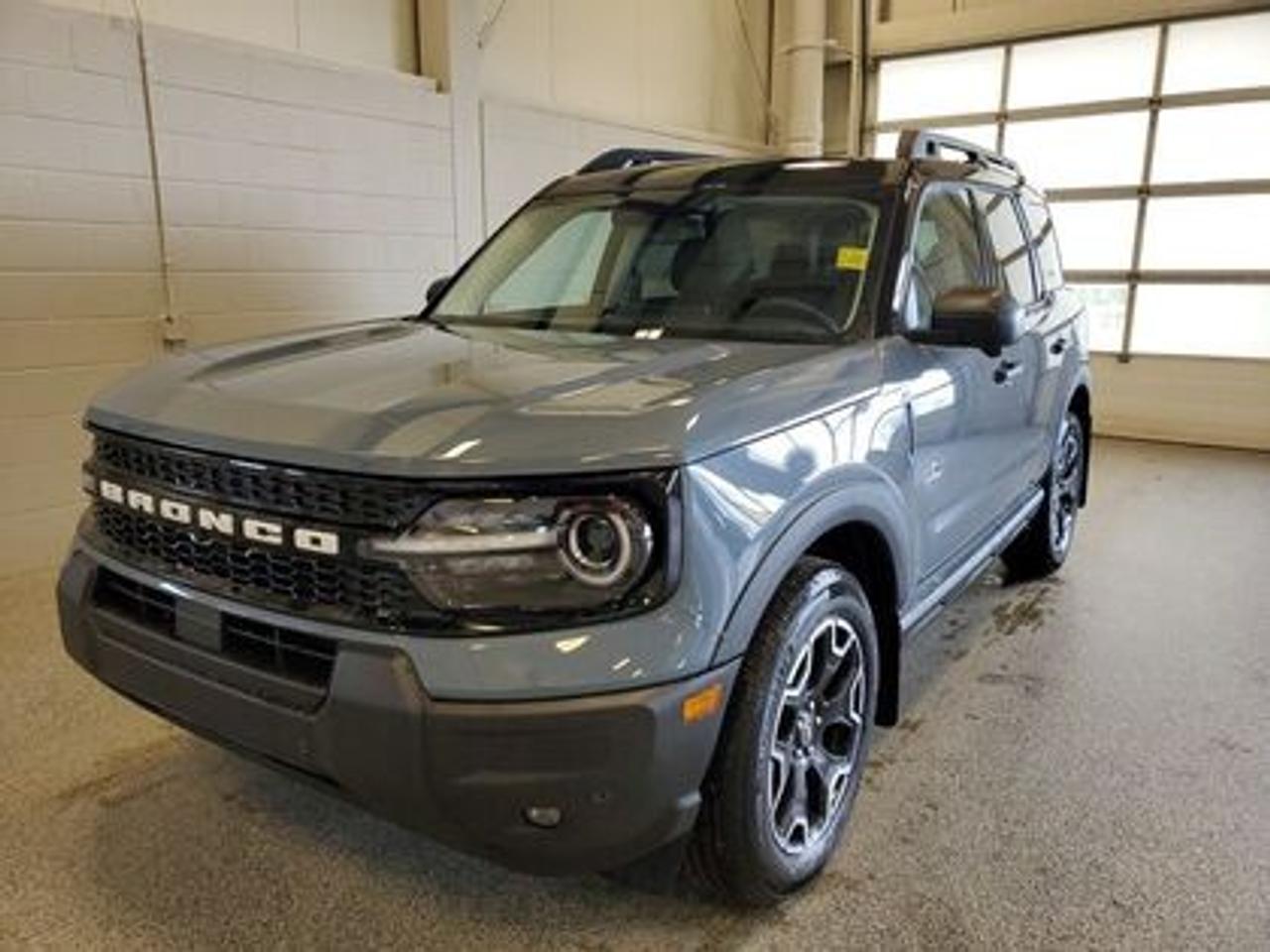 This all-new 2025 Ford Bronco Sport Outer Banks 300A shines in Azure Grey Metallic. This 5-passenger compact SUV is powered by the 1.5L EcoBoost® engine, delivering 181 horsepower and 190 lb-ft of torque. With an 8-speed automatic transmission and Auto Start-Stop Technology, it offers a smooth yet efficient drive, ideal for city commutes or highway adventures.

Key Features:
Premium-Trimmed Sport Heated Front Seats
Premium-Wrapped Heated Steering Wheel
Rear Parking Sensors
Memory Drivers Seat 
6-Way Power Passenger Seat
Push-Button Start
SYNC® 4 with a 13.2-inch Center Display, Wireless Apple CarPlay® and Android Auto
18 Machined-Face Ebony Black-Painted Aluminum Wheels
Dual-Zone Temperature Control
Terrain Management System Electronic Automatic  with 5 G.O.A.T. Modes (Normal, ECO, Sport, Slippery, Off-Road)
LED Headlights, Fog Lights, and Signature Lights
FordPass® Connect with Remote Start
Outerbanks Tech Package

Moose Jaw Ford, conveniently located at 1010 North Service Road in Moose Jaw, is your trusted destination for all your automotive needs. With an impressive 4.8-star Google rating from nearly 1,500 reviews, we are proud to deliver an exceptional vehicle-buying experience tailored just for you. Our Moose Jaw Motives set us apart, offering unbeatable value like half-priced oil changes for life on pre-owned vehicles, one year of key and remote protection, and one year of tire and rim protection. Enjoy peace of mind with every purchase. At Moose Jaw Ford, were committed to driving positive change in our community by combining exceptional service, high-quality vehicles, and a guest-first approach. Visit us today!