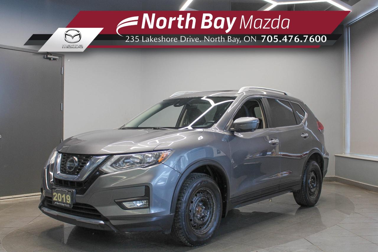 This 2019 Nissan Rogue SV is a practical SUV that fits everyday life well. Its comfortable, smooth on the road, and offers plenty of space for passengers and cargo. FEATURES: AWD, Cloth upholstery, Heated front seats, Heated steering wheel, Touchscreen infotainment system, CD Player, Bluetooth connectivity, Backup camera, Navigation, Large cargo area, Split-folding rear seats. 

Why Youll Want to Buy from North Bay Mazda? *The Clubhouse Commitment Pre-Owned Vehicle Program provides you with additional coverage for things such as the 3-year Tire and Rim Coverage, The Clubhouse Powertrain Warranty, coverage for The Little Things like battery, wiper, and bulb replacement, 3- year anti-theft protection to give you the ultimate peace of mind when purchasing a pre-owned vehicle. Clubhouse Commitment is an optional coverage which 
can be purchased at time of sale for a $699 value. Pre-Owned Vehicle purchases are subject to an adjusted price when purchasing with cash. You are eligible for Finance Pricing with a maximum down payment of 15% of listed finance price. Contact us for more details. * Our certified vehicles go through a 120-point Clubhouse Certified Used Vehicle Inspection, and we will provide the CarFax vehicle history documents as well as any available service history. * We competitively price our vehicles below the market average which means that we have already done all the market research for you. Rest assured that you are getting the best deal possible. * We have automotive financial experts who are experienced in dealing with all levels of credit challenges. We also work with all major banks and third-party lenders daily so we are confident that we can get you the best rate available. * As a premier New and Pre-Owned vehicle 
dealership, we pride ourselves on a superior customer experience and a lifetime of customer care. We are conveniently located at 235 Lakeshore Drive, in North Bay, Ontario. If you cant make it to us, we can accommodate you! Call us today at 705-476-7600 to come in and see this vehicle!