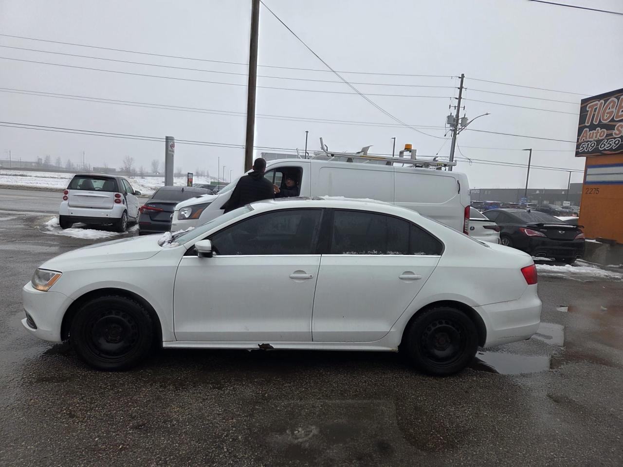 2014 Volkswagen Jetta COMFORTLINE, SEDAN, AUTO, 4 CYL, RUNS WELL, AS IS Photo