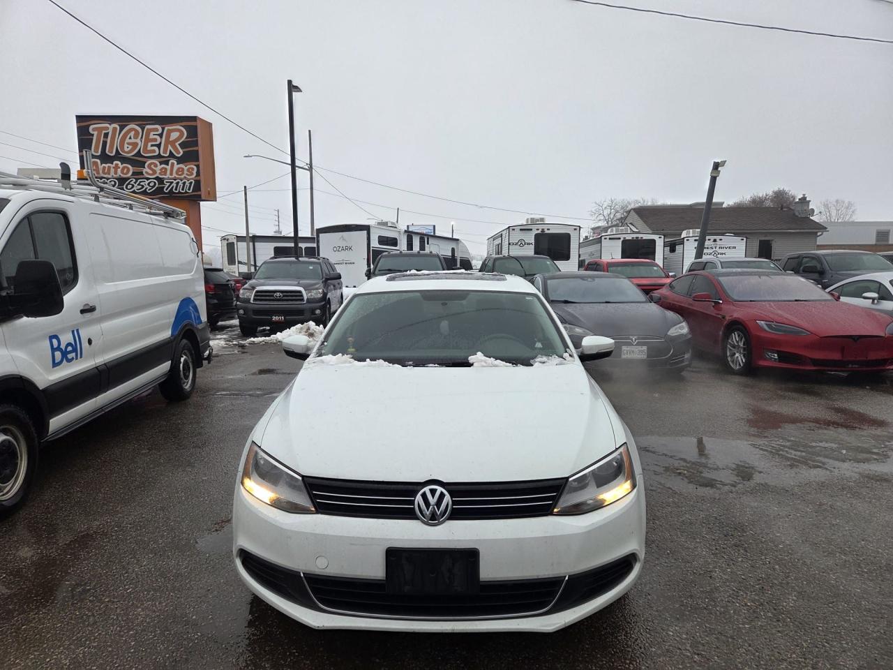 2014 Volkswagen Jetta COMFORTLINE, SEDAN, AUTO, 4 CYL, RUNS WELL, AS IS Photo