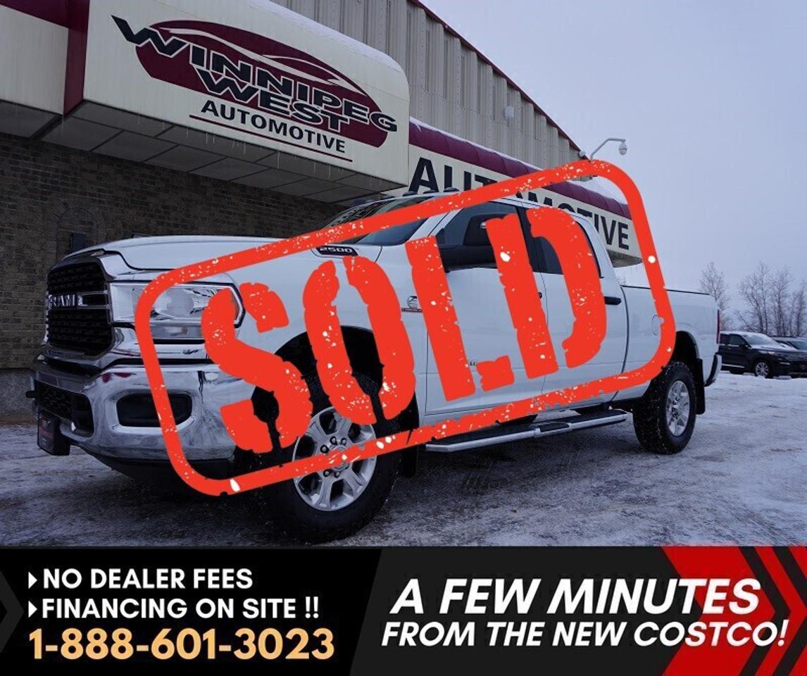 *** Dealer arranged financing on site! Quick, Simple,  no calls or waiting on bank appointments required!! Drive away today ***   NO ADMINISTRATION FEES!!

2023 RAM 2500 BIG HORN CREW CAB 4X4 | 6.7L CUMMINS DIESEL | ONLY 64,000 KMS | SHOWS LIKE NEW

This 2023 RAM 2500 Big Horn Crew Cab 4x4 is a hard-to-find low-kilometer diesel truck that combines legendary Cummins power, heavy-duty capability, and modern technology. With only 64,000 original kilometers, this truck is exceptionally clean, clearly well maintained, and still shows like new inside and out. Finished in Bright White with a Black interior and Diesel Grey premium cloth seating, this RAM delivers a clean, professional look that Is perfect for work, towing, or daily driving.

Power comes from the highly sought-after 6.7L Cummins I-6 turbocharged diesel engine, paired with a 6-speed automatic transmission, offering outstanding torque, long-term reliability, and confident towing performance. The electronic shift-on-the-fly 4x4 system makes this truck ready for winter driving, off-road use, job sites, and heavy loads.

PERFORMANCE & HEAVY-DUTY CAPABILITY

- 6.7L Cummins I-6 turbocharged diesel engine
- 6-speed automatic transmission
- Electronic shift-on-the-fly 4x4
- Anti-spin rear differential
- Snow Chief Group with dual alternators
- Engine block heater
- Off-Road Group with hill descent control and tow hooks
- Heavy-duty front and rear shock absorbers
- Class V hitch receiver
- 4-pin and 7-pin trailer wiring
- Trailer Sway Control and Trailer Light Check

INTERIOR COMFORT & TECHNOLOGY

- Premium cloth front bucket seats
- Heated front seats and heated steering wheel
- Power 8-way adjustable driver seat with power lumbar
- Rear 60/40 split-folding bench seat
- Push-button start and remote start system
- Dual-zone automatic climate control
- Uconnect 5 NAV with 8.4-inch touchscreen
- GPS navigation
- Apple CarPlay and Android Auto
- Alexa Built-In
- SiriusXM with 360L
- 4G LTE Wi-Fi hotspot
- Media hub with USB ports
- 3.5-inch full-color driver information display

SAFETY & DRIVER ASSIST

- ParkView rear backup camera
- Rear backup alarm
- Advanced multistage airbags
- Side curtain and seat-mounted airbags
- Electronic Stability Control
- Traction Control
- Brake Assist
- Hill Start Assist
- Electronic Roll Mitigation
- Sentry Key theft deterrent system
- Security alarm

EXTERIOR & UTILITY FEATURES

- Crew Cab with spacious rear seating
- Power heated folding telescoping mirrors
- Forward and reverse utility lights
- Clearance lamps
- Fog lamps
- Bright cab-length side steps
- Mopar spray-in bedliner
- Rear wheelhouse liners
- Locking tailgate
- LT all-terrain on/off-road tires

CONDITION

- Only 64,000 kms
- Very clean and well cared for
- Still shows like new
- Non-smoker vehicle
- No signs of abuse or heavy wear

This 2023 RAM 2500 Big Horn Cummins Diesel 4x4 is an excellent choice for buyers searching for a low-kilometer diesel truck, heavy-duty towing capability, and modern comfort and technology in one package. Clean Cummins trucks like this are in high demand and dont stay long. Contact us today to book a test drive or request more information. 

Comes with a Manitoba Safety Certification, and we have many Extended Powertrain warrantys available on your vehicle purchase up to 10-year coverage (on eligible vehicles see dealer for details). Financing on site with Zero down financing OAC. Trades accepted. View at Winnipeg West Automotive Group, 5195 Portage Ave. (only a couple of minutes past the new Costco) Dealer permit # 6007, Call now 1(888) 601-3023. This Car is located in Winnipeg Manitoba,  however we can have it shipped anywhere in North America relatively inexpensively.
