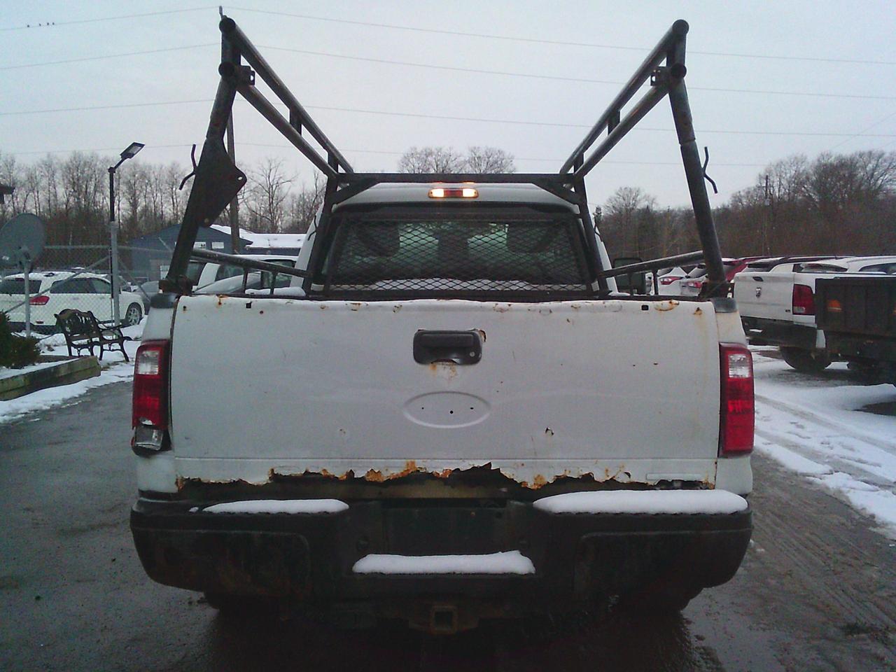 2012 Ford F-250 2WD Reg Cab 137 XL Snow Plow Photo
