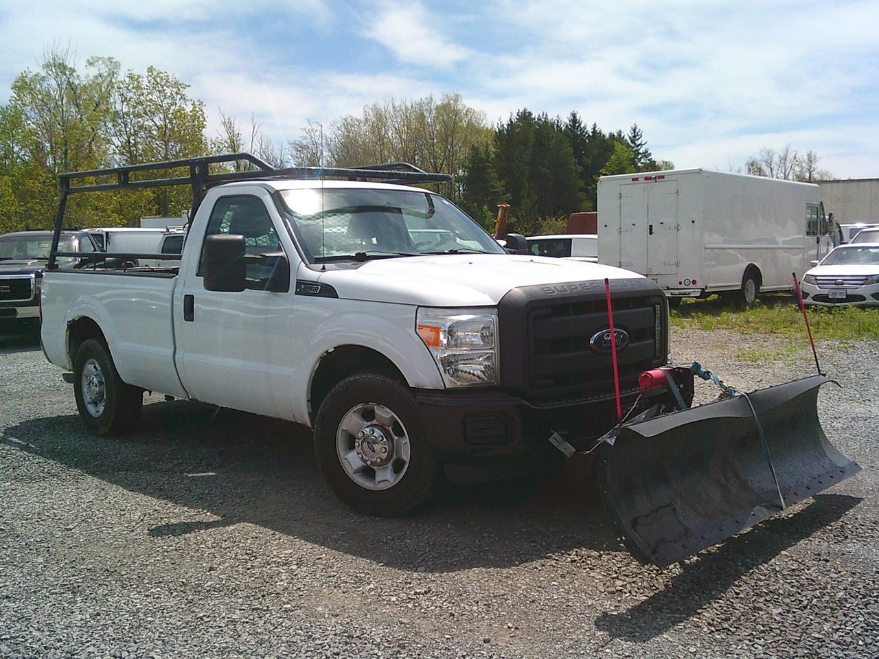 2012 Ford F-250 2WD Reg Cab 137 XL Snow Plow Photo