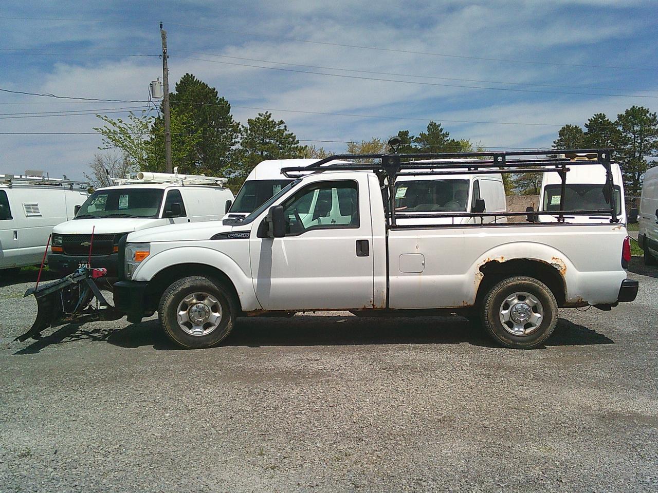 2012 Ford F-250 2WD Reg Cab 137 XL Snow Plow Photo