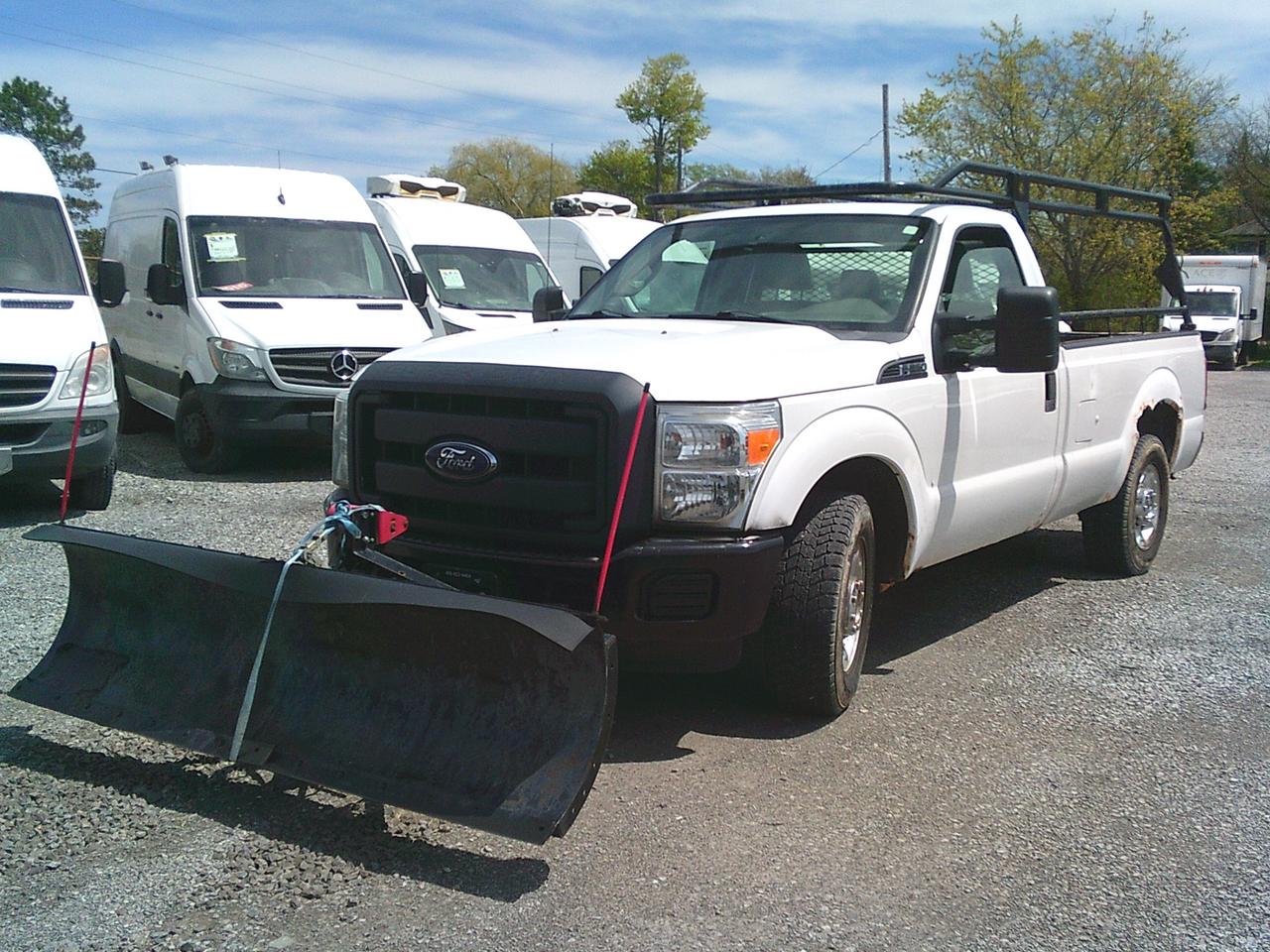 2012 Ford F-250 2WD Reg Cab 137 XL Snow Plow Photo