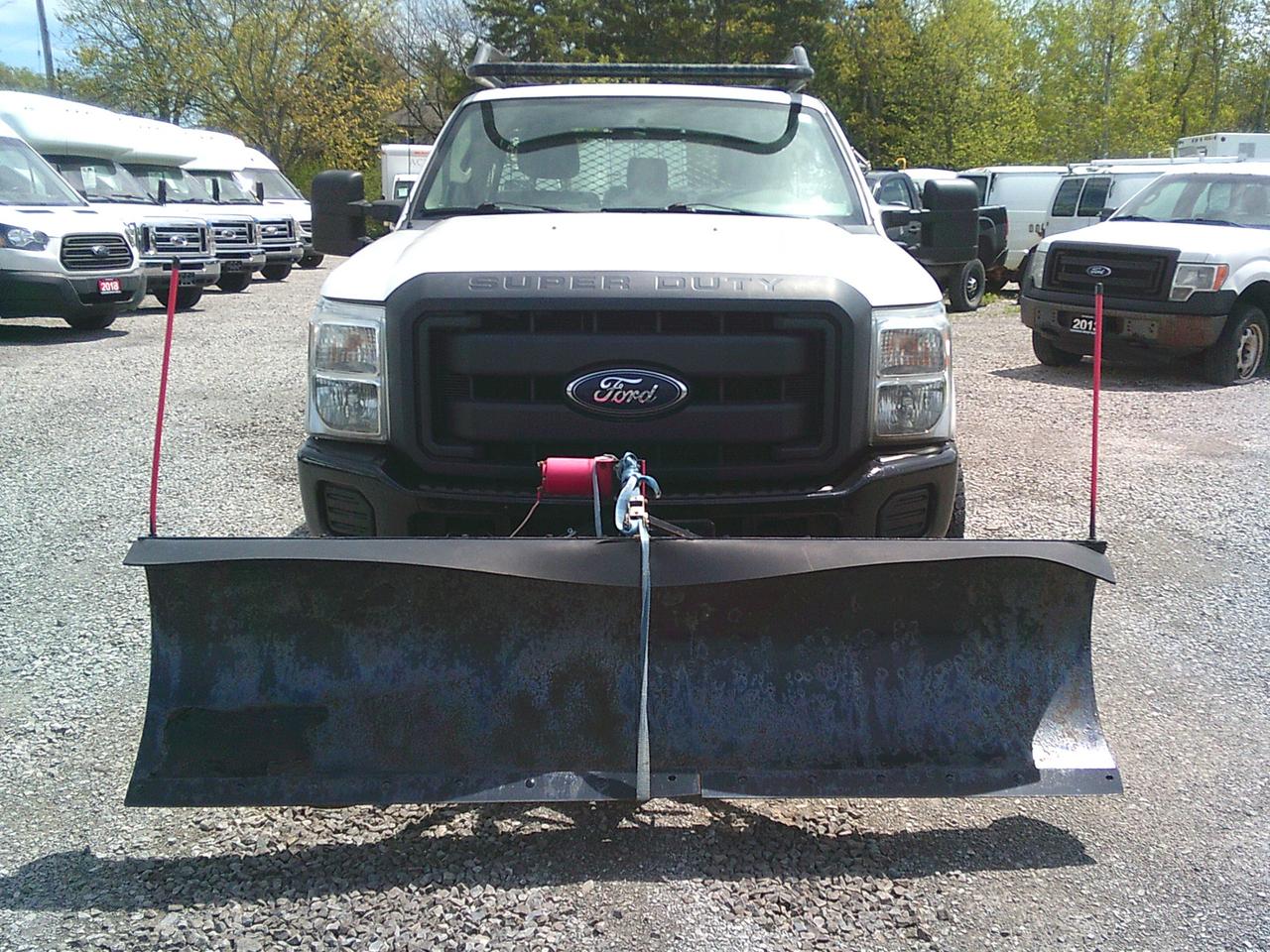2012 Ford F-250 2WD Reg Cab 137 XL Snow Plow Photo