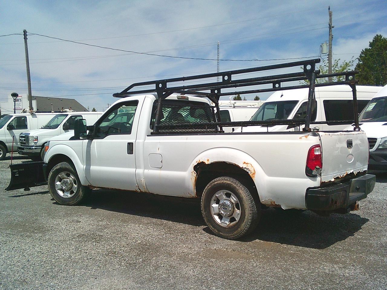 2012 Ford F-250 2WD Reg Cab 137 XL Snow Plow Photo