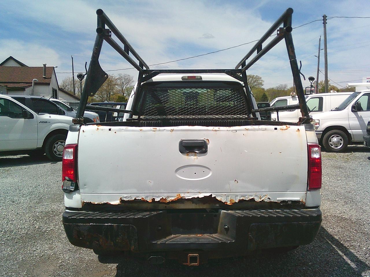2012 Ford F-250 2WD Reg Cab 137 XL Snow Plow Photo